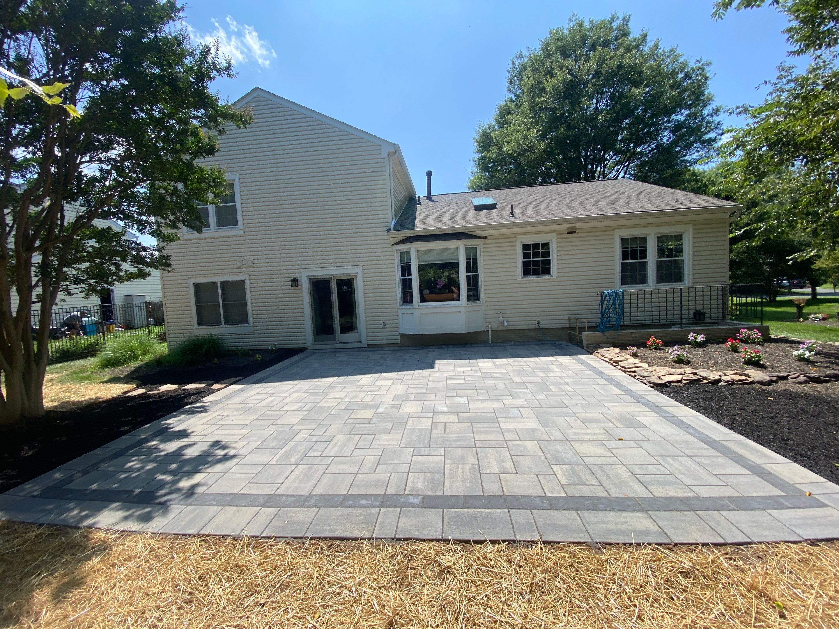 Backyard Transformation using Techo-Bloc Pavers by The Smet Companies, LLC