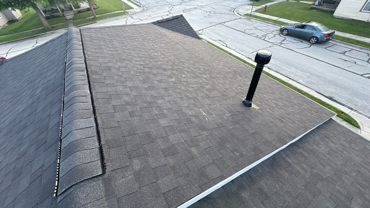 Residential Roofing Installation using Atlas Pinnacle Pristine Black by Nitro Roofing and Construction