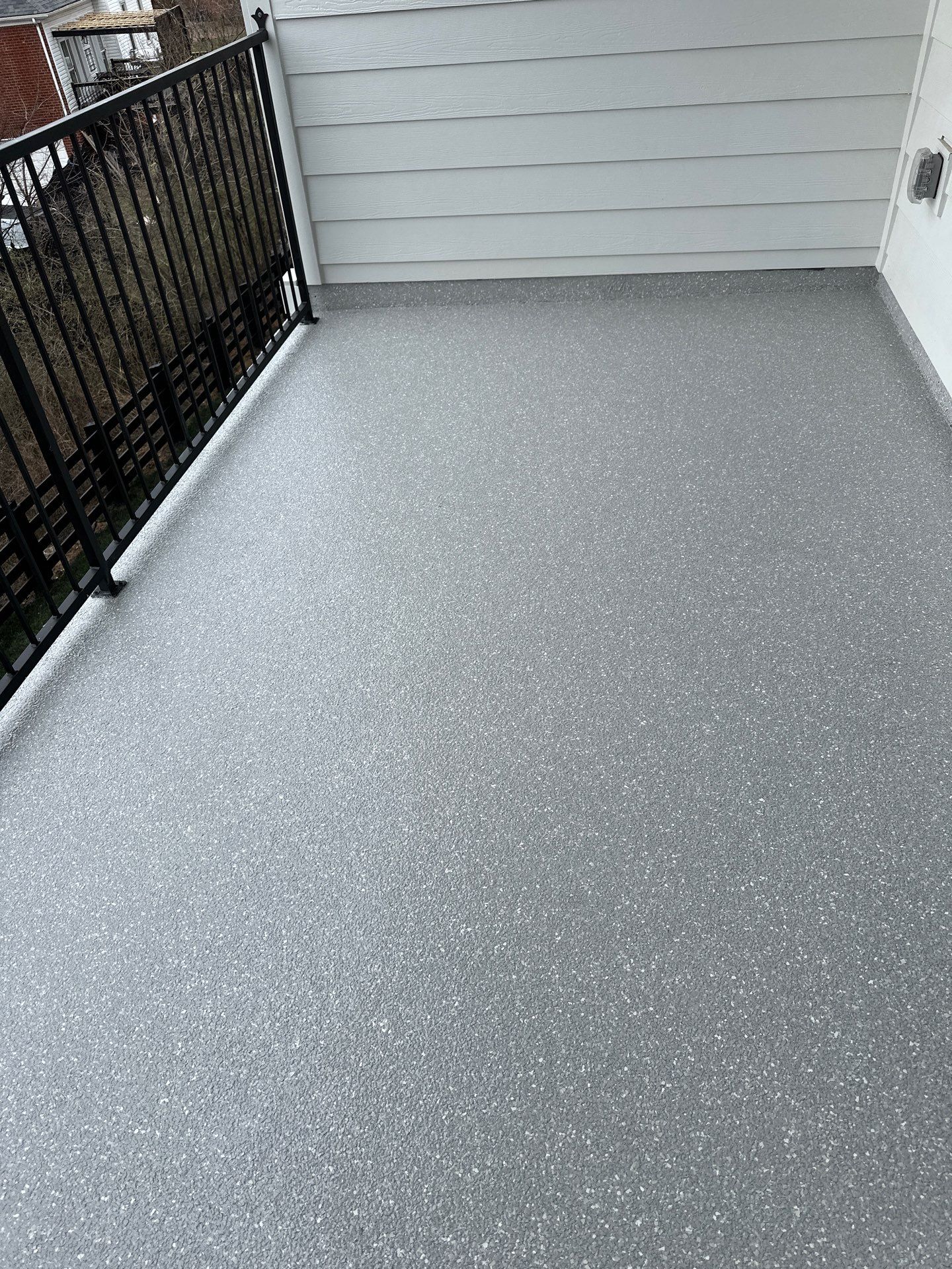 Patio Floor Coating using Custom Color by My Garage Floor Guys