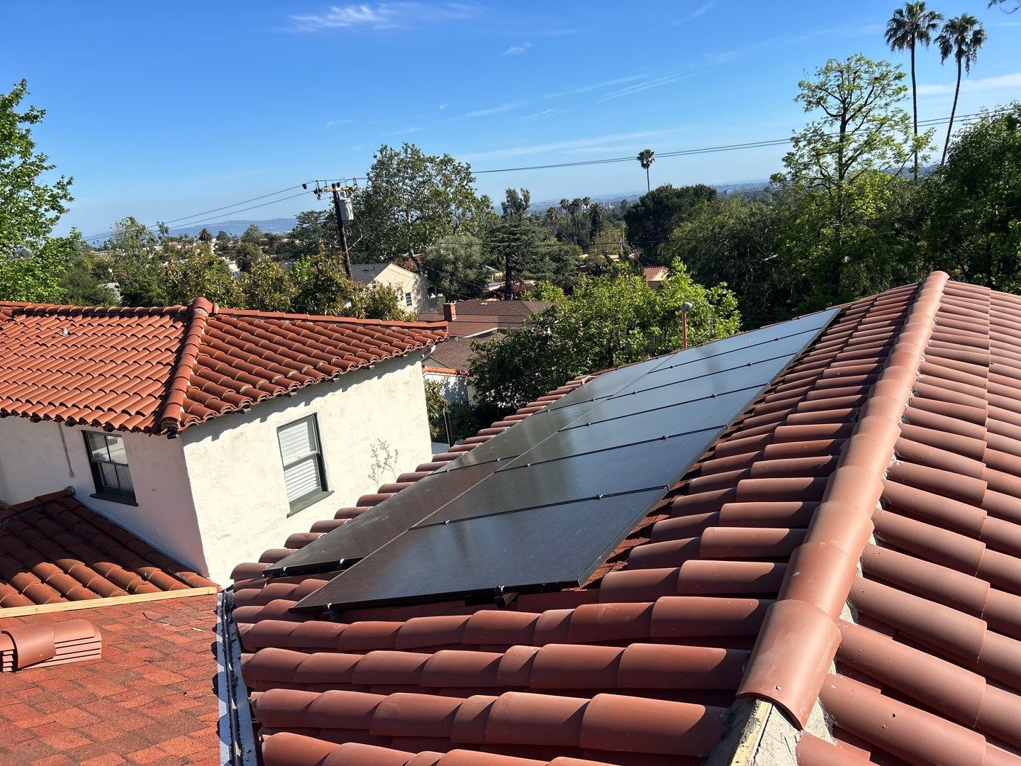 Spanish-Style Roof Replacement with Integrated Solar in Altadena by Reliable Roofing San Diego Inc.