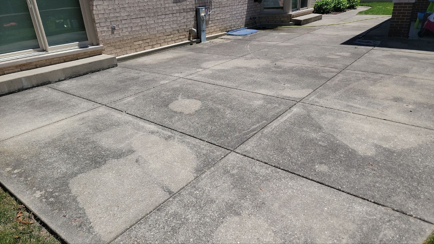 concrete power washing Algaecide, soft wash soap by Northern Power Washing LLC.
