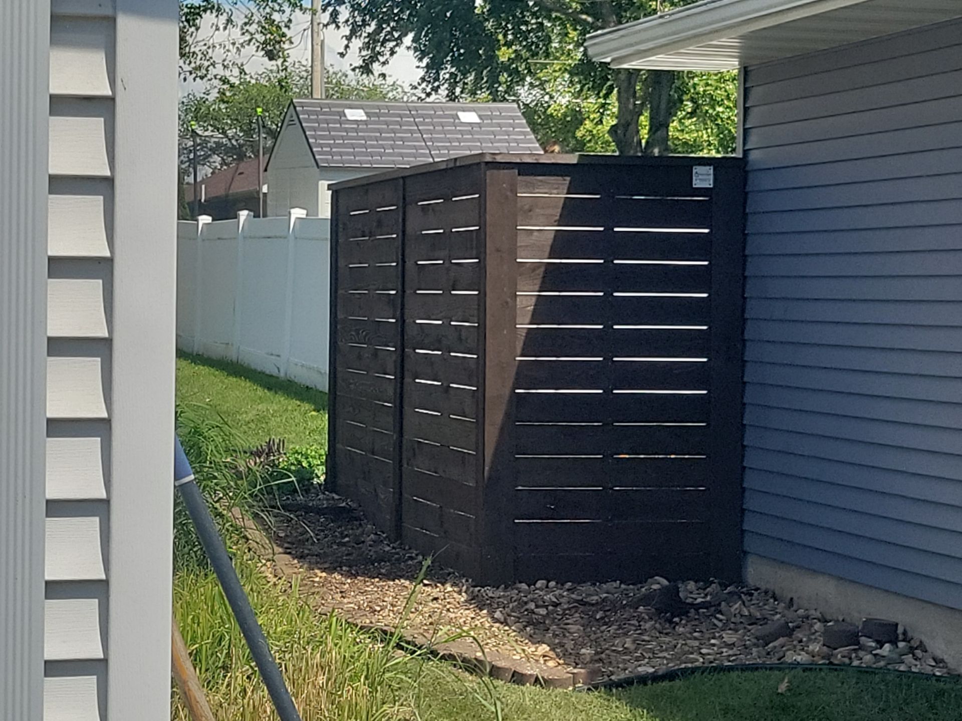 Custom Horizontal Slat Privacy Cedar Chocolate Screen Installation in Hudson by Perfect Picket Fence and Stain