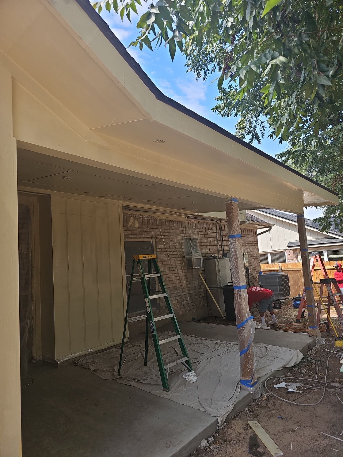 Beautiful New Covered Patio by DeZign Roofing & Exteriors