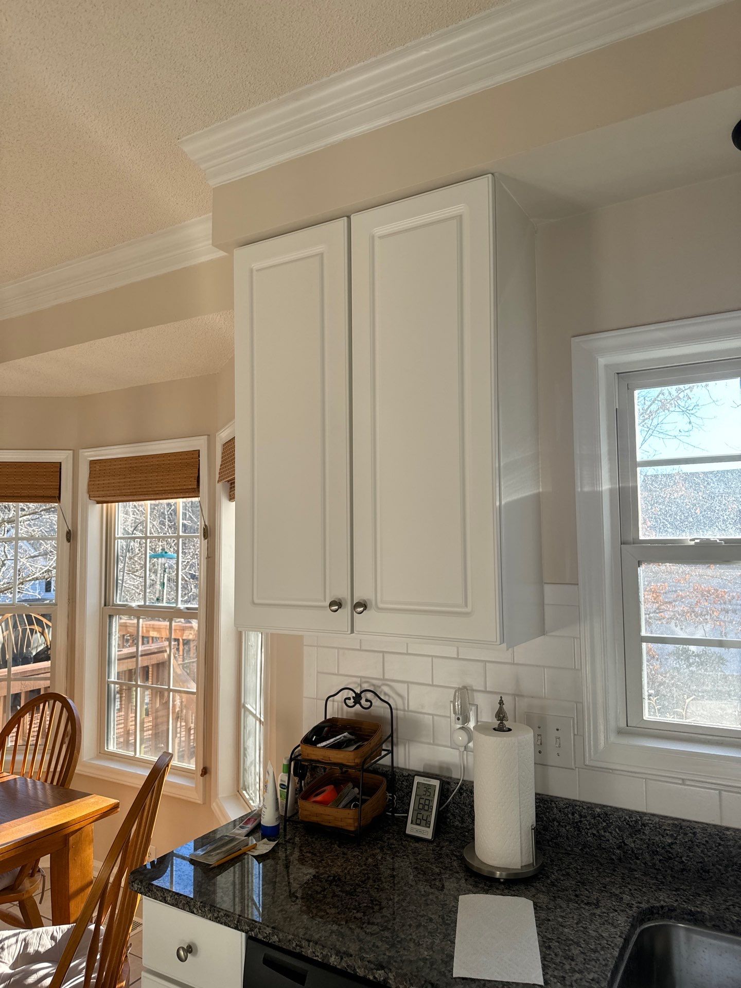 Cabinet painting by GonzalezPainters & Contractors Inc 