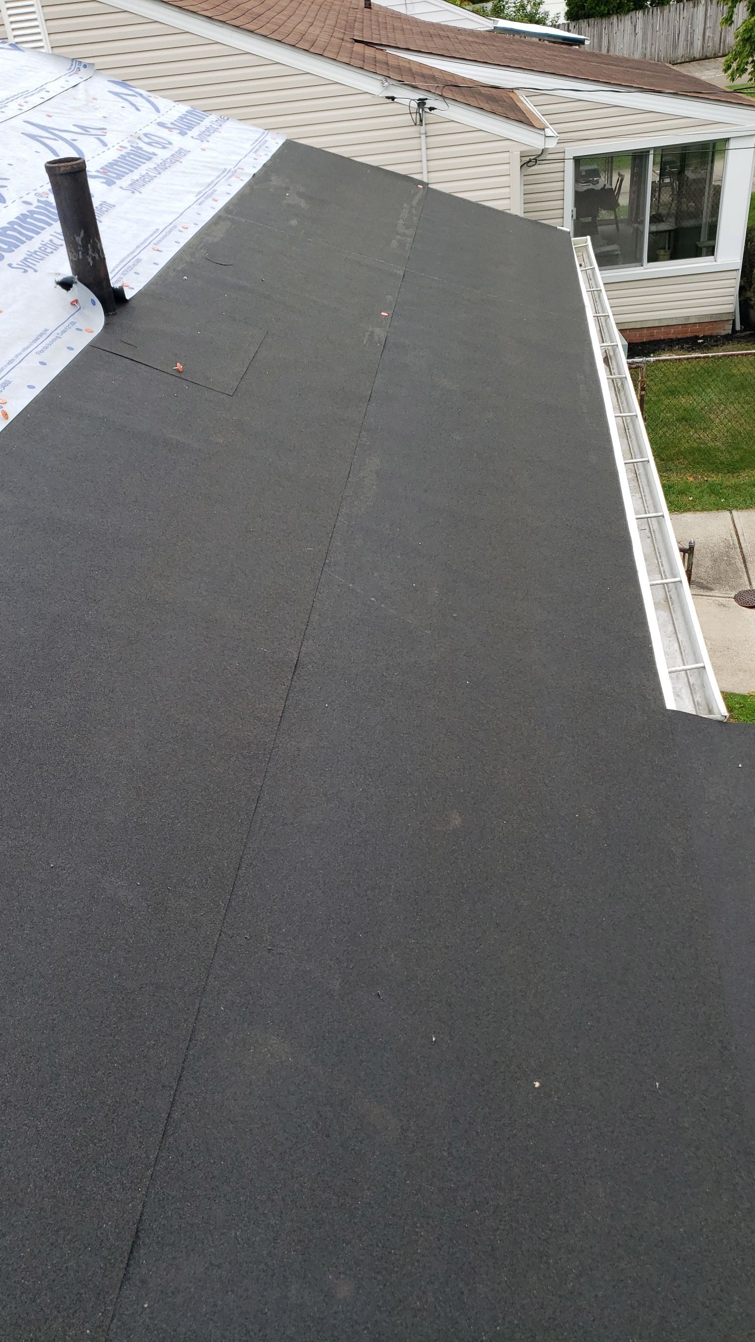 ATLAS PINNACLE COLOR: PRISTINE BLACK SHADOW DRIP EDGE: WHITE by Eagle Eye Roofing
