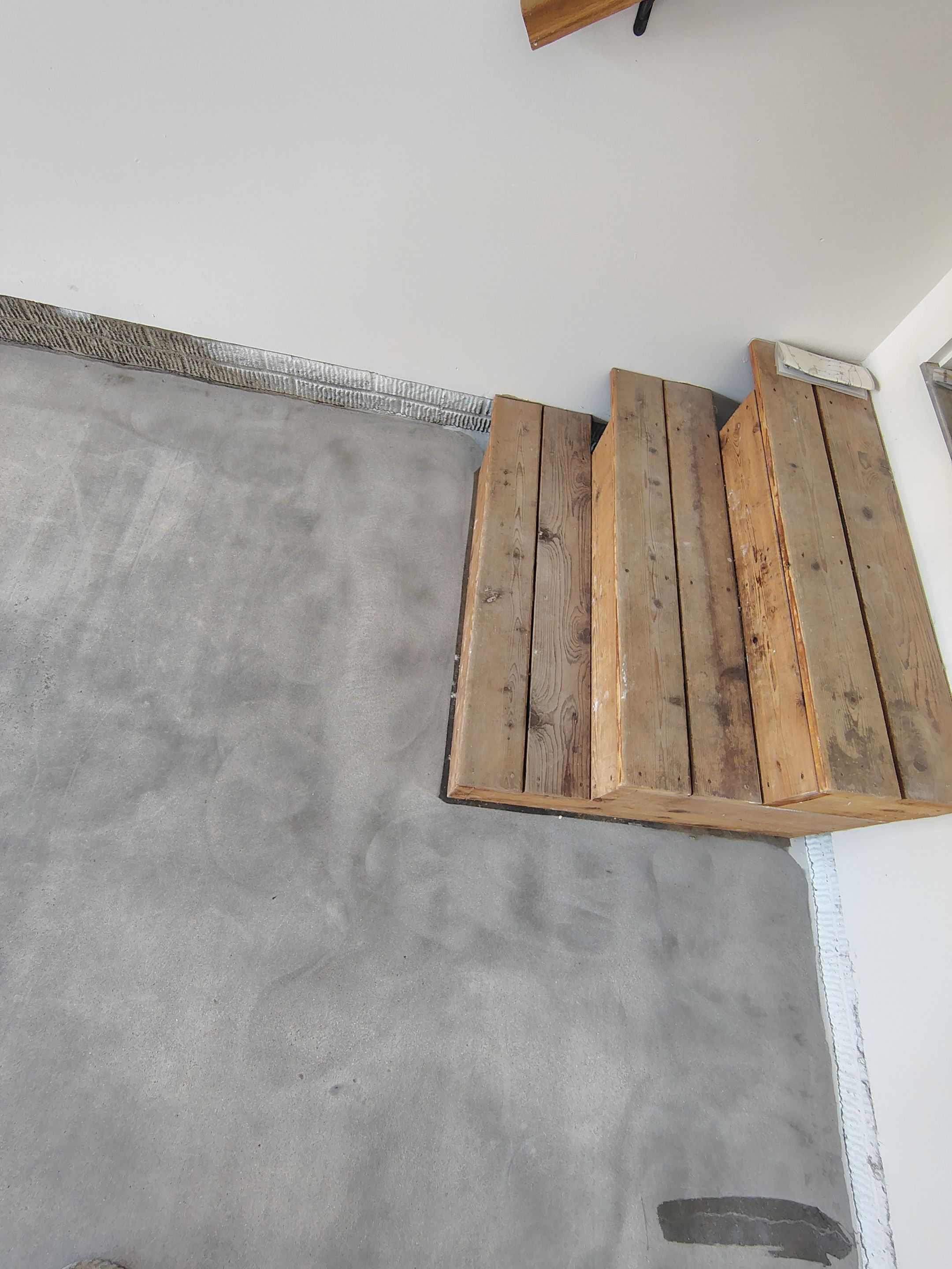 Custom Grey Speckled Epoxy Floor Coating for Sioux Falls Garage by Select Painting, Coatings & Garage Cabinets