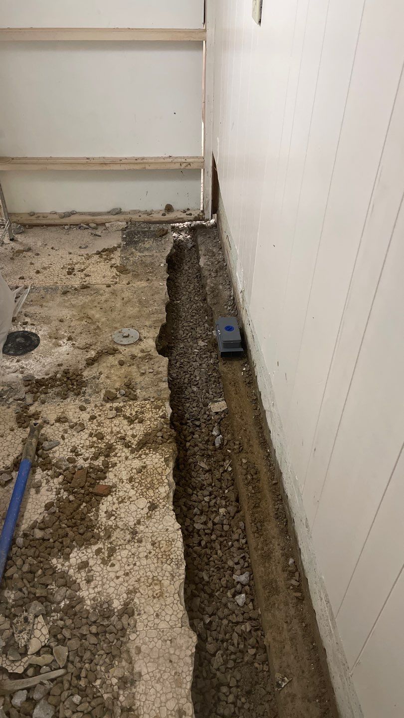 Interior Waterproofing Using GrateDrain™ Products by Toledo Basement Repair