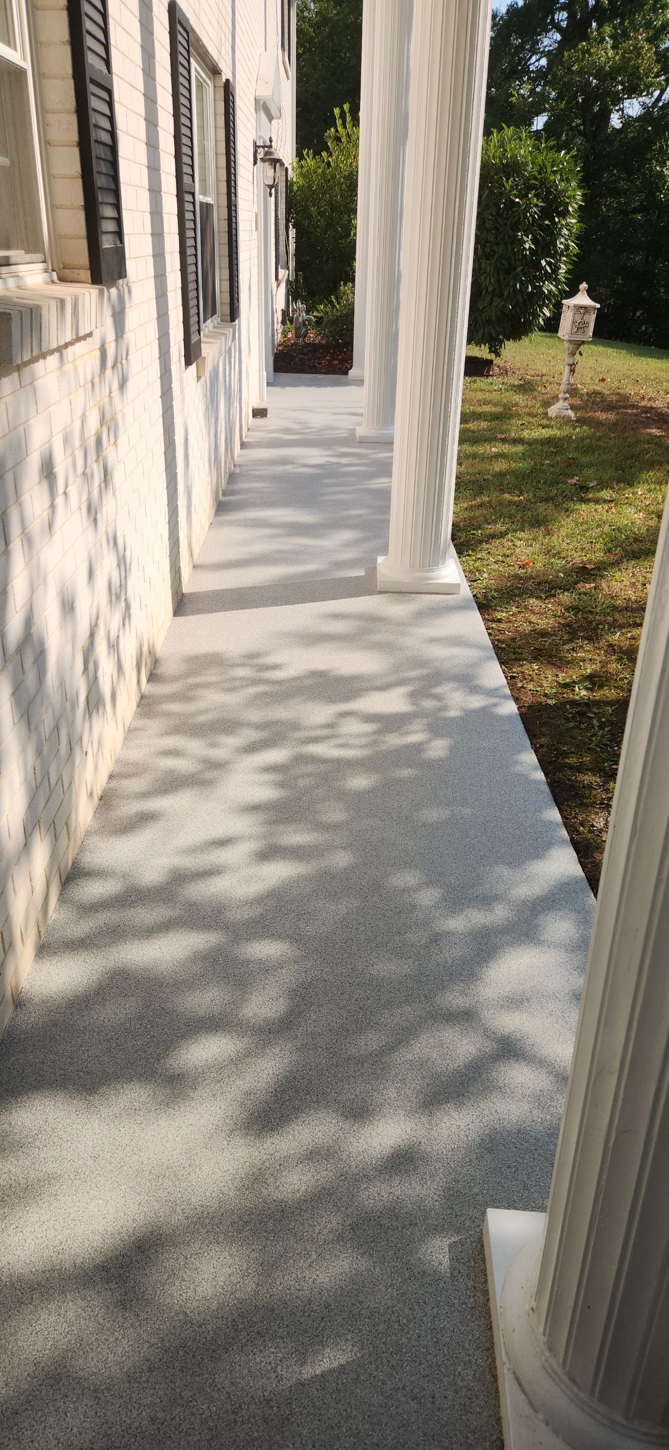 Sidewalk & Garage using Dovetail by Elite Floor Solutions
