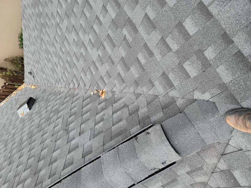 Residential Roofing Installation using Roof Replacement by American Roofing & Construction LLC