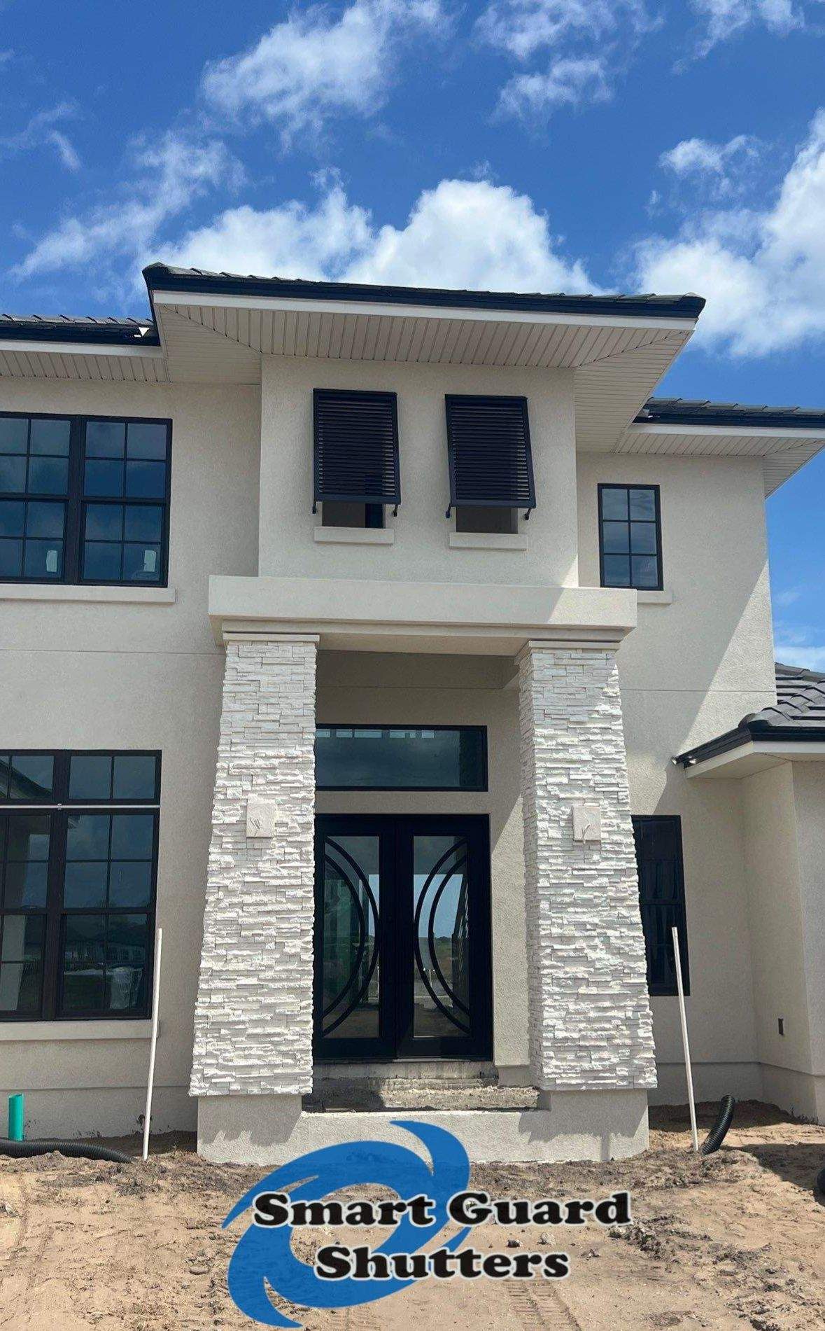 Decorative Bahamas in Gray Brown by Smart Guard Shutters