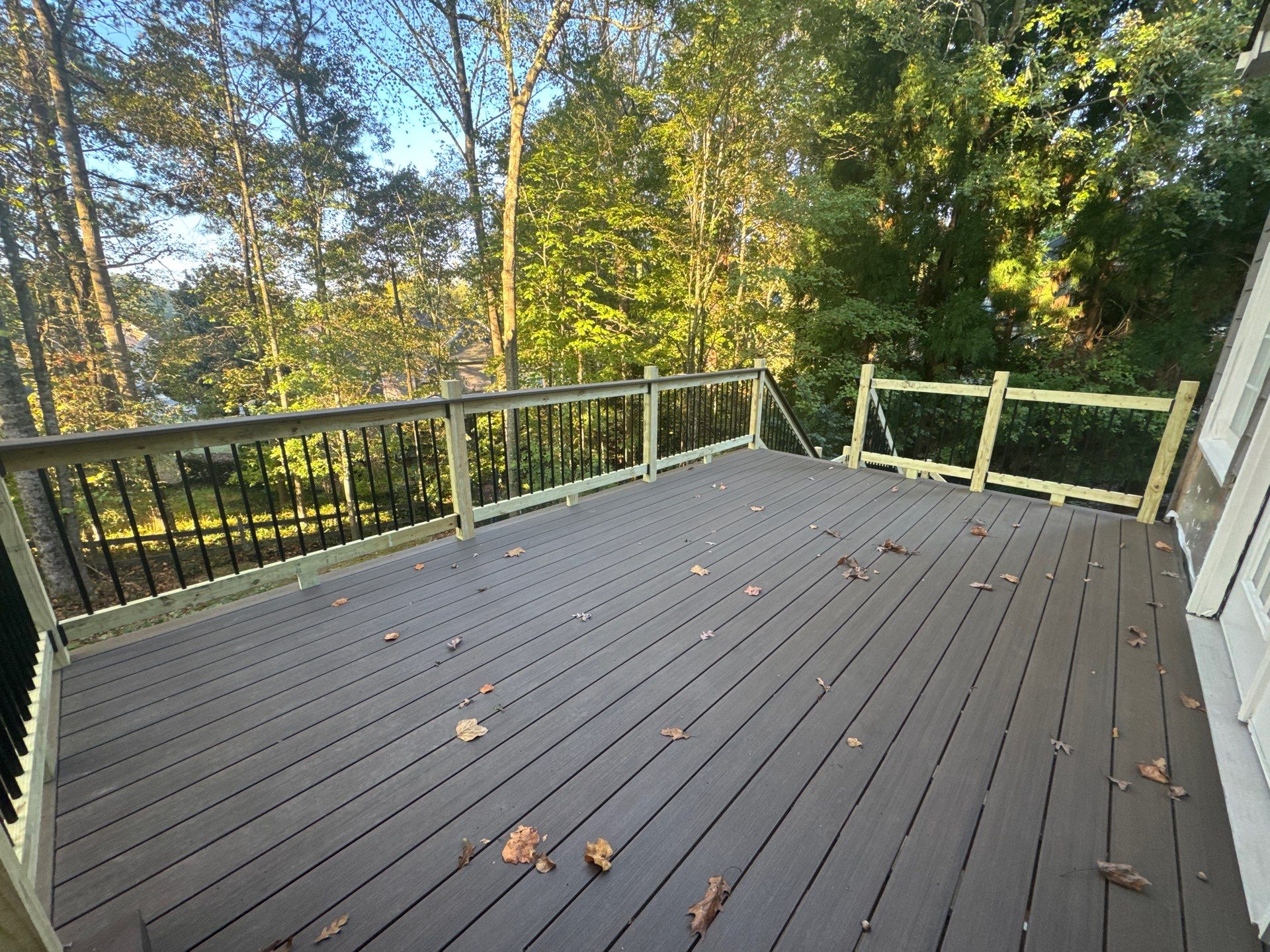 Custom Multi-Level Composite Deck and Sunroom Addition in Suwanee by Swift Home Renovations 