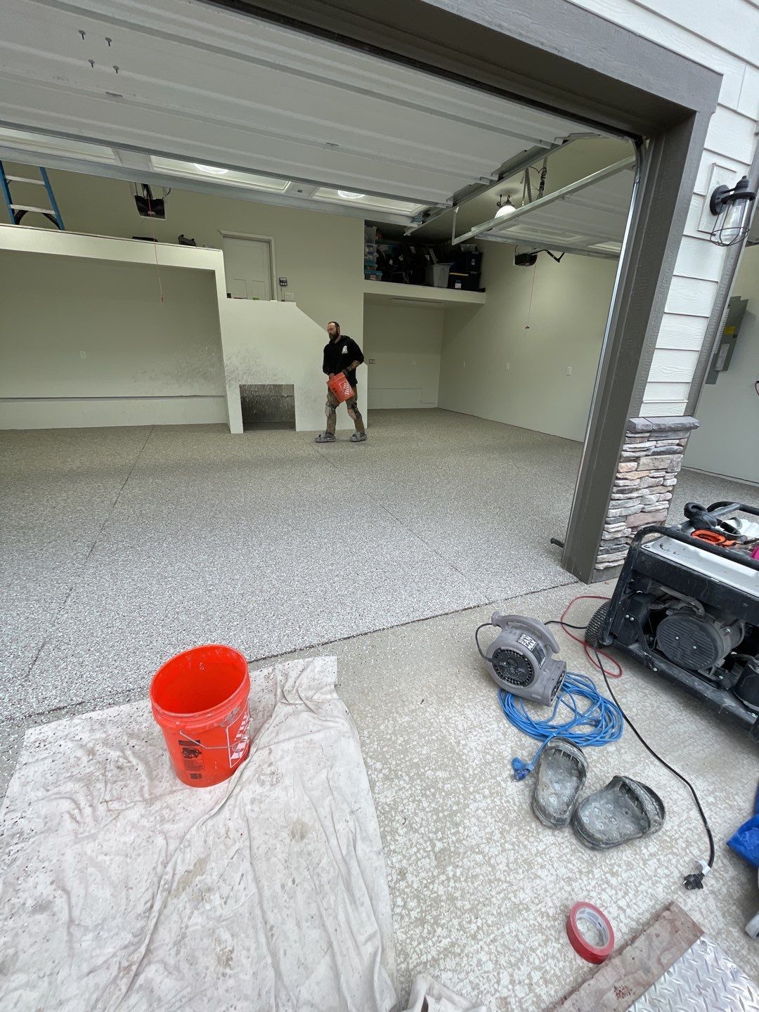 Garage Transformation using Pebble Beach by Croc Coatings, LLC
