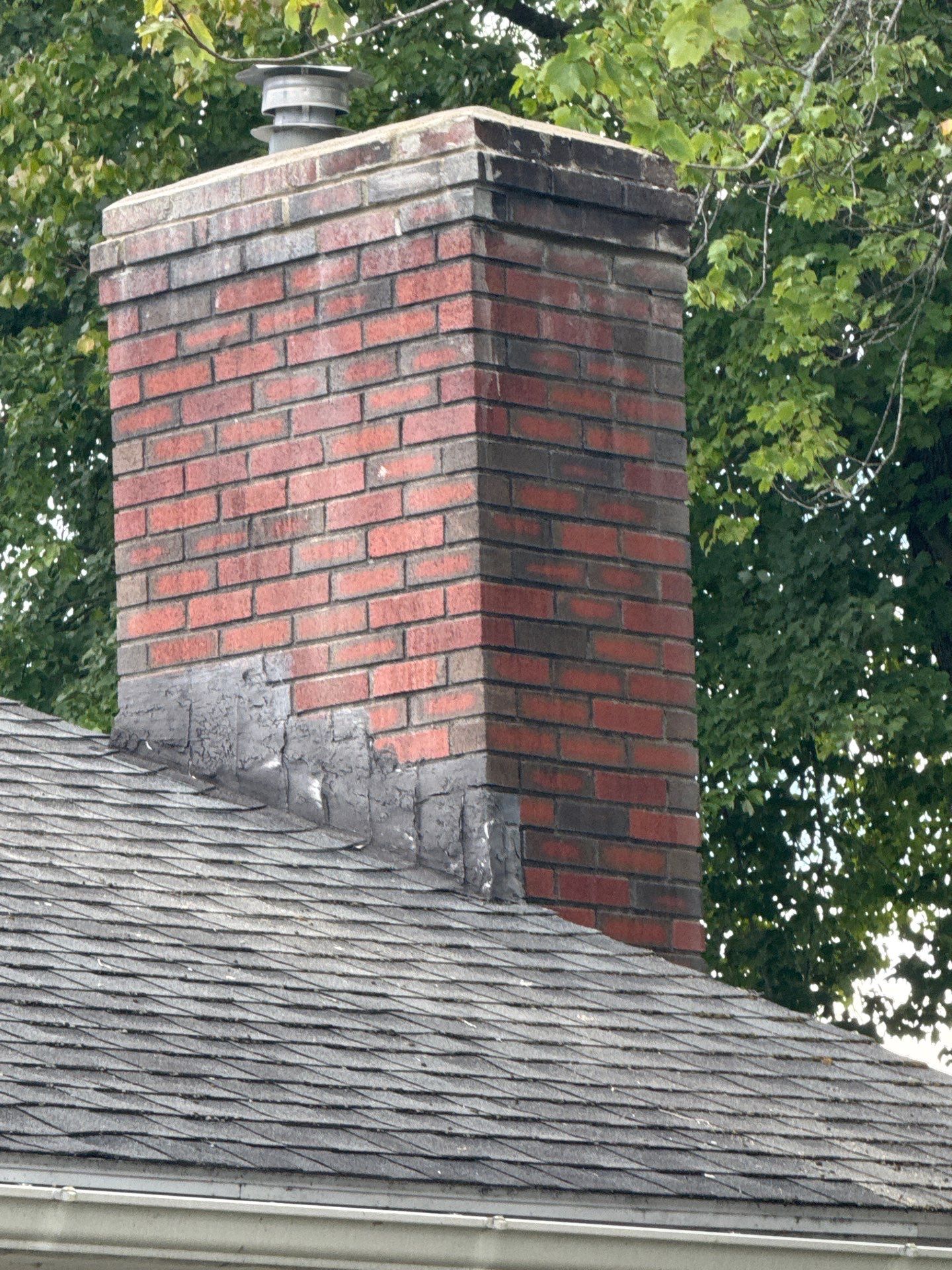 Lowell Premium Velux Curb-Mount Skylight & Chimney Restoration by Mighty Dog Roofing of Greater Middlesex County
