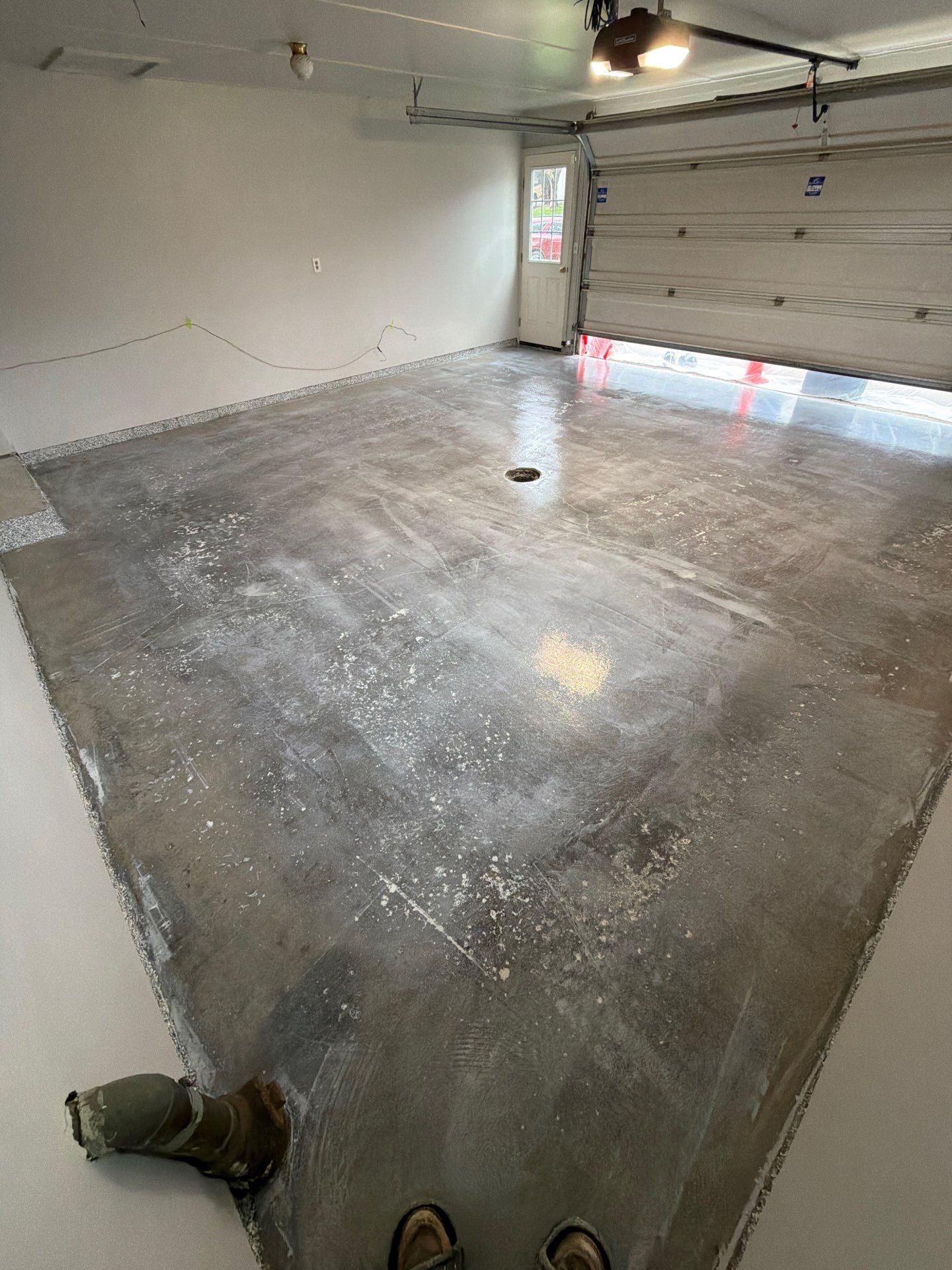 Muskegon Garage Interior Painting and Epoxy Flake Floor Installation by Gordon Painting