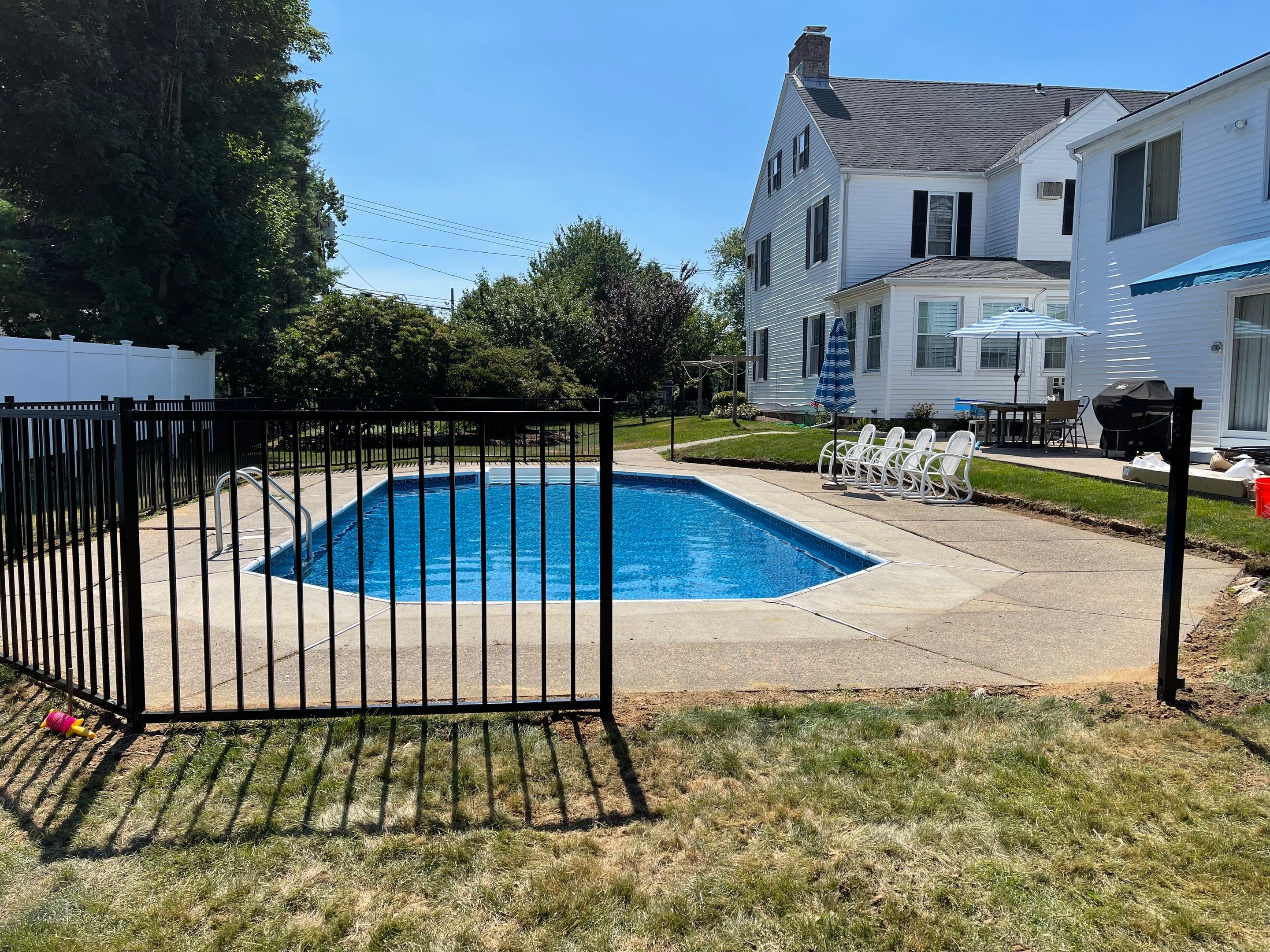 Black Aluminum Pool Fence by DiGiorgi Roofing and Siding Inc