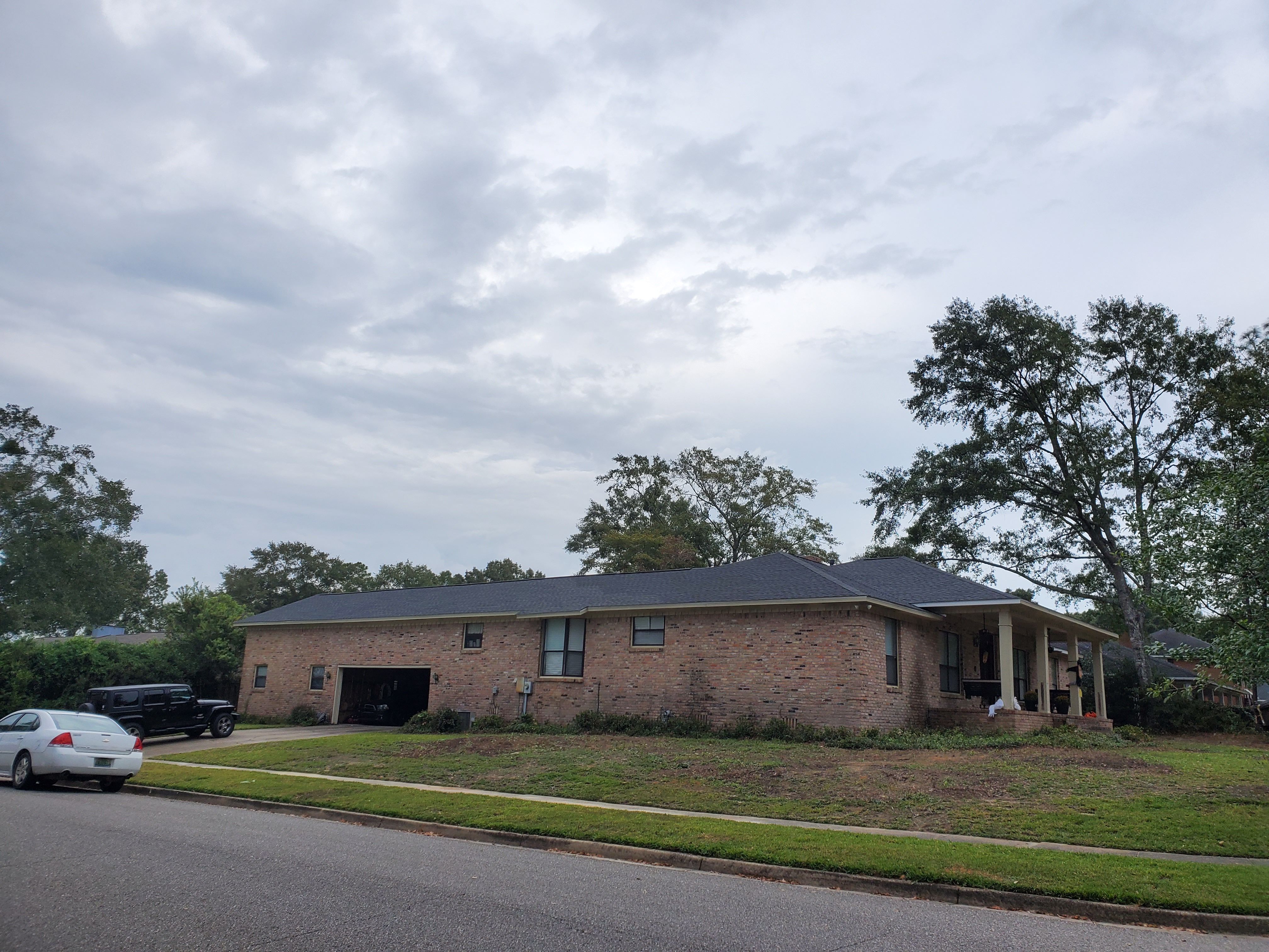 Residential Roofing Installation using Roof Replacement by American Roofing & Construction LLC