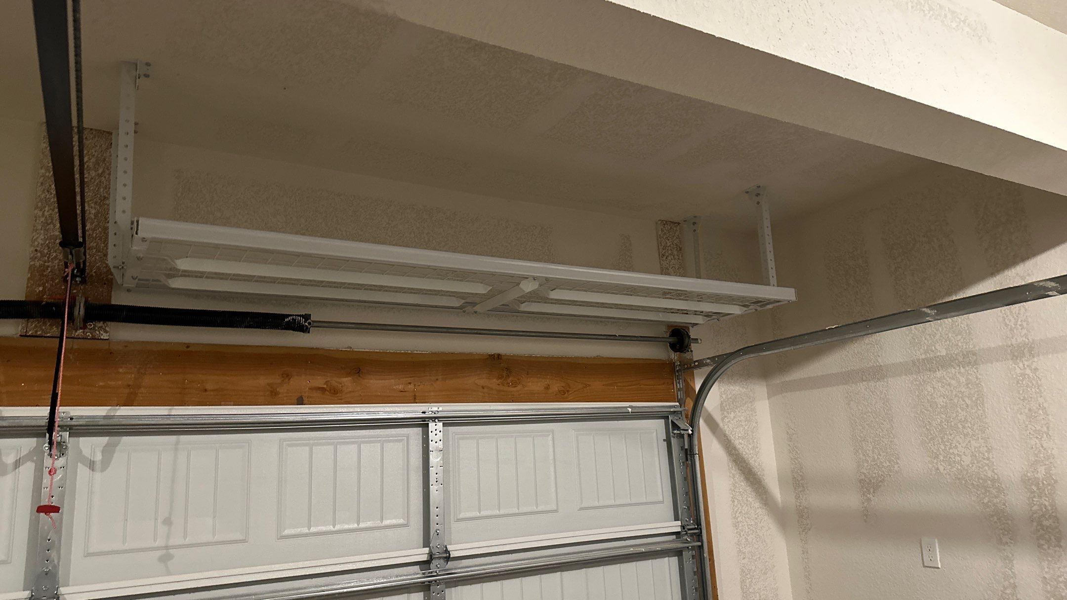 Dillon C added these overhead racks to his garage by Banner Garage