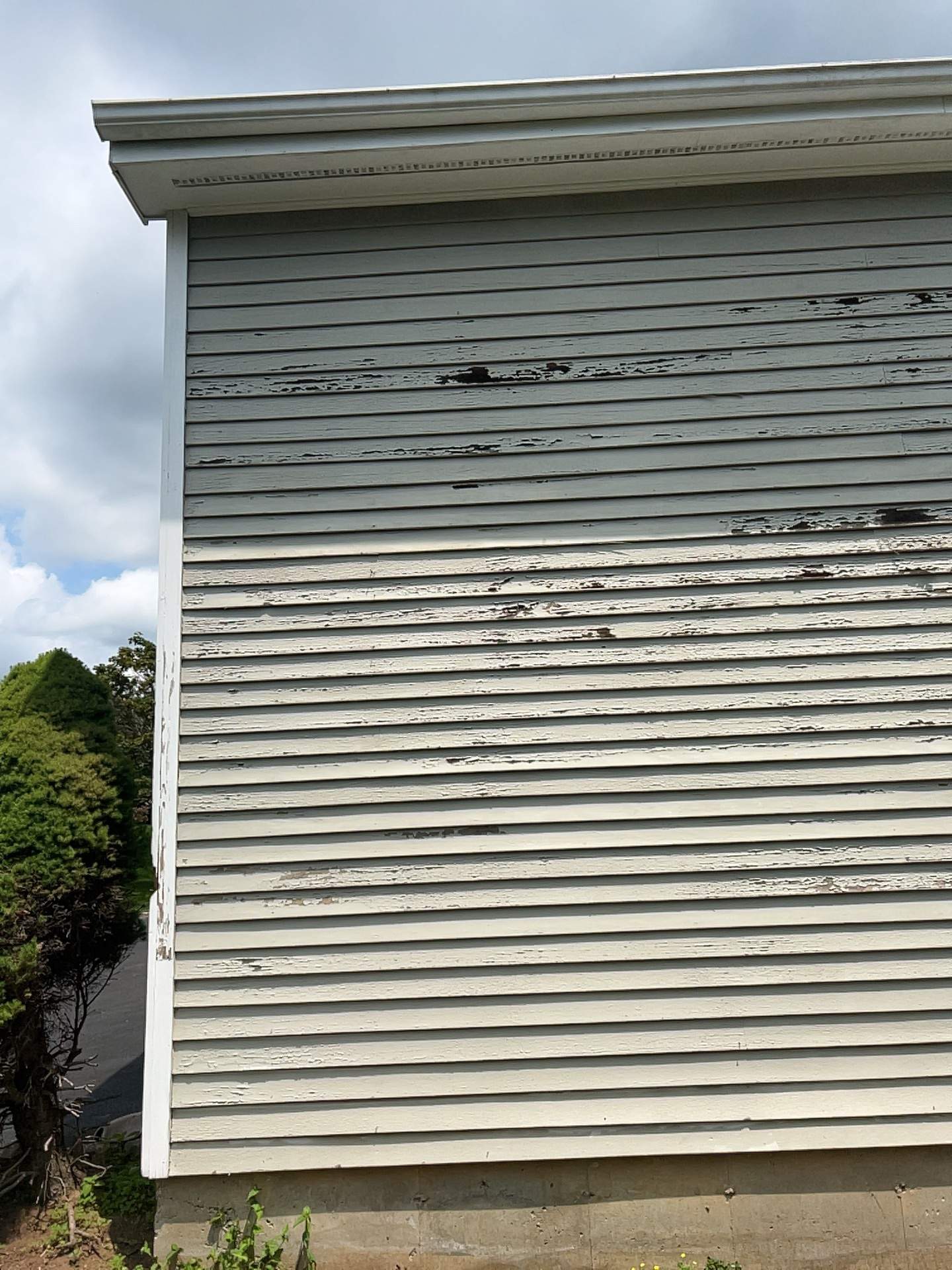 Siding Installation using Mainstreet Colonial & White gutters by A Plus Exterior