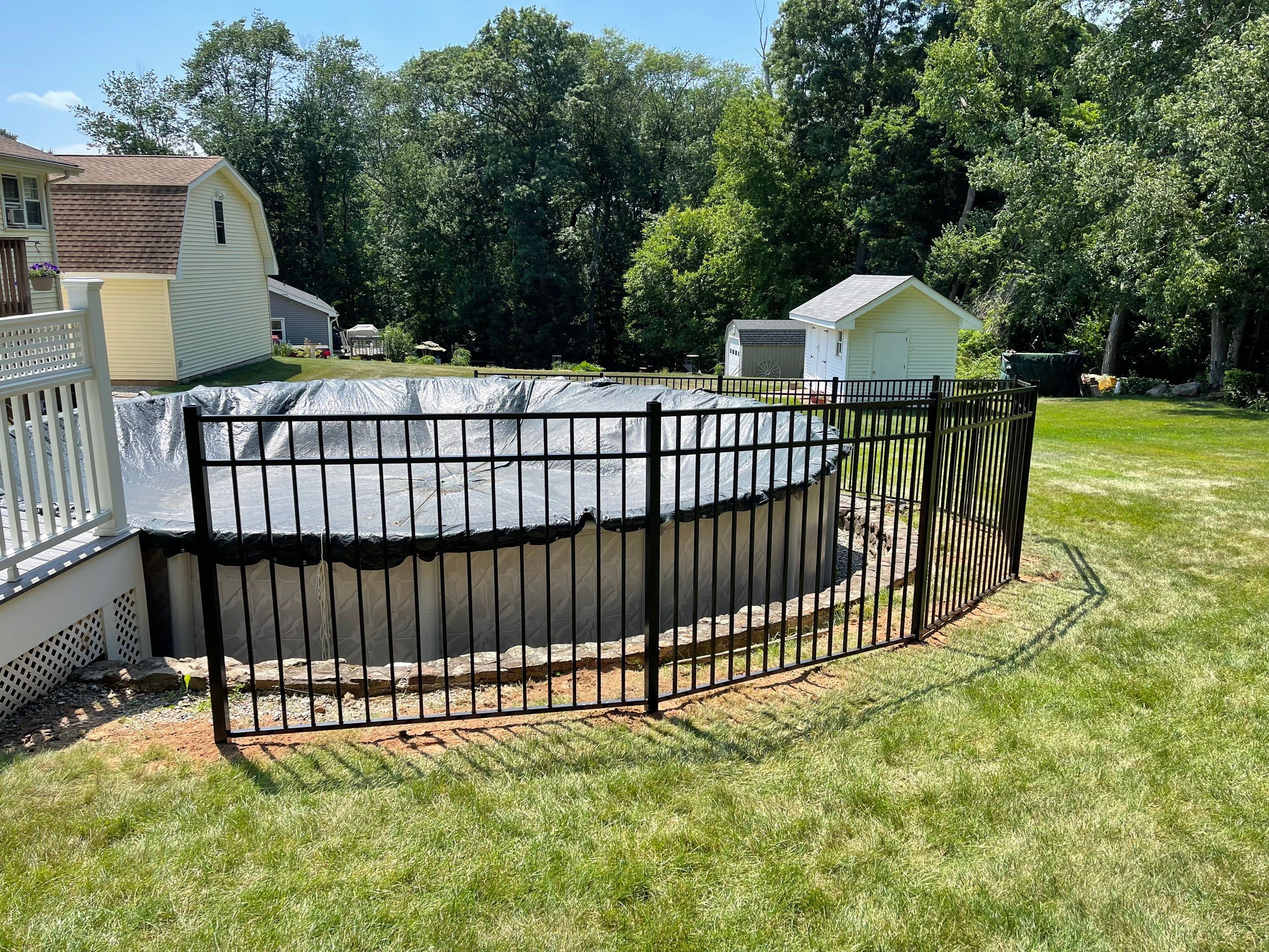 New Aluminum pool fence with matching gate and pool latch by DiGiorgi Roofing and Siding Inc