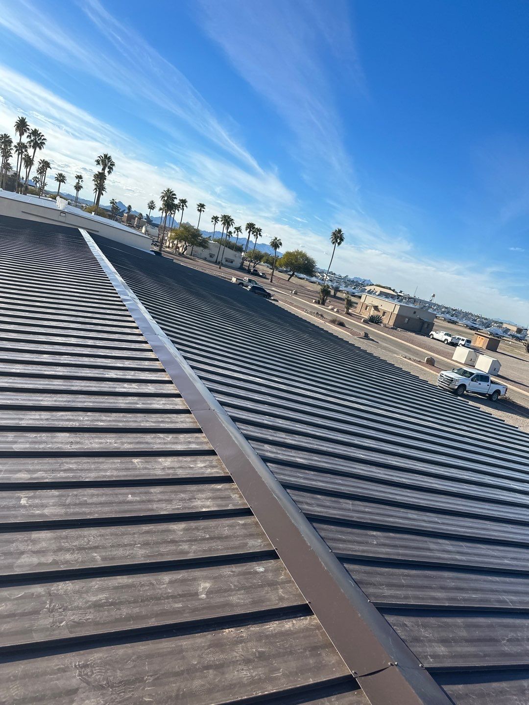 Burnished Exposed Fastener by Reimagine Roofing