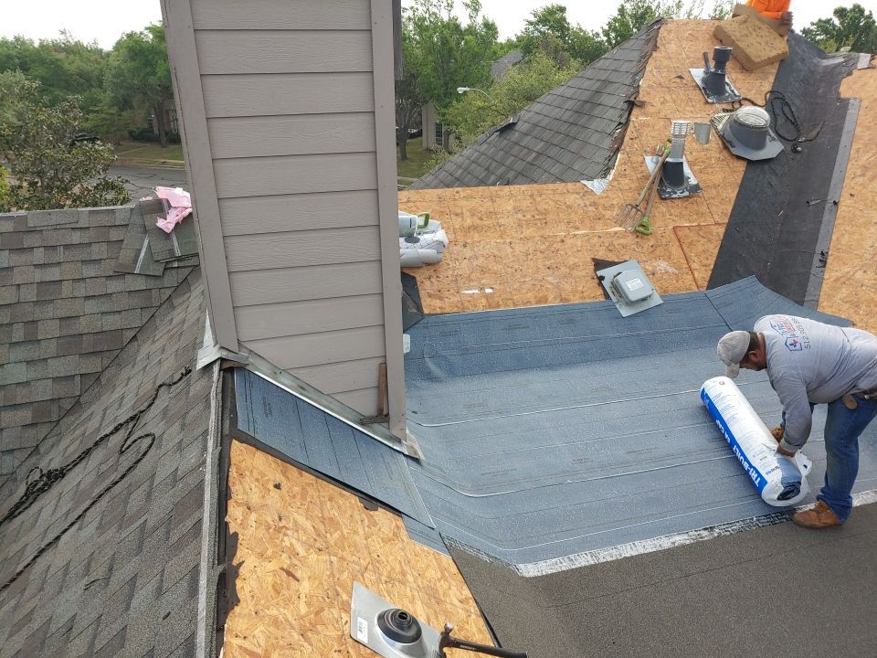 Residential Roof Replacement and Solar Panel Integration in Austin by Caliber Restoration LLC