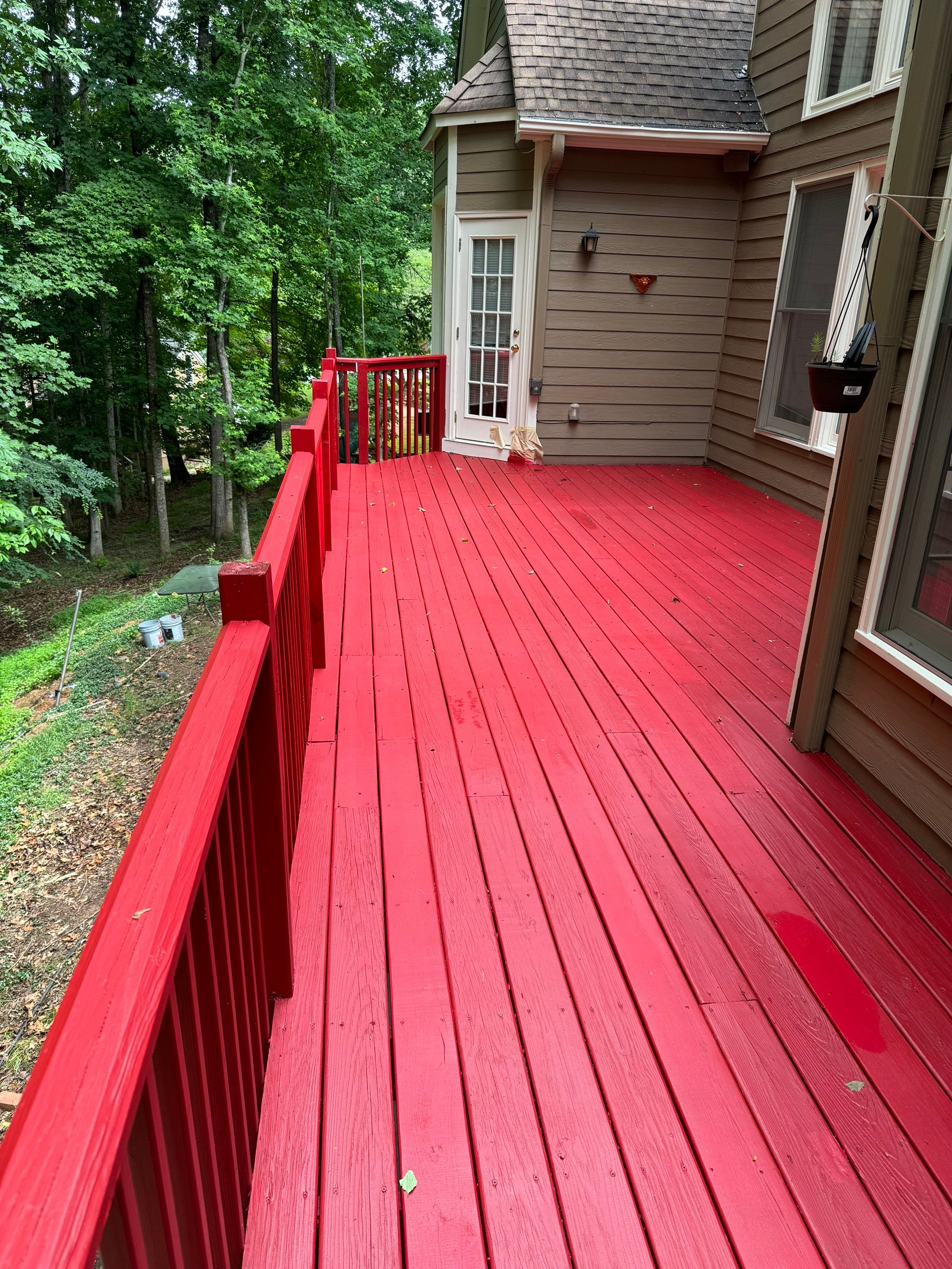 Exterior Painting and Comprehensive Wood Deck Repairs in Suwanee by Swift Home Renovations 