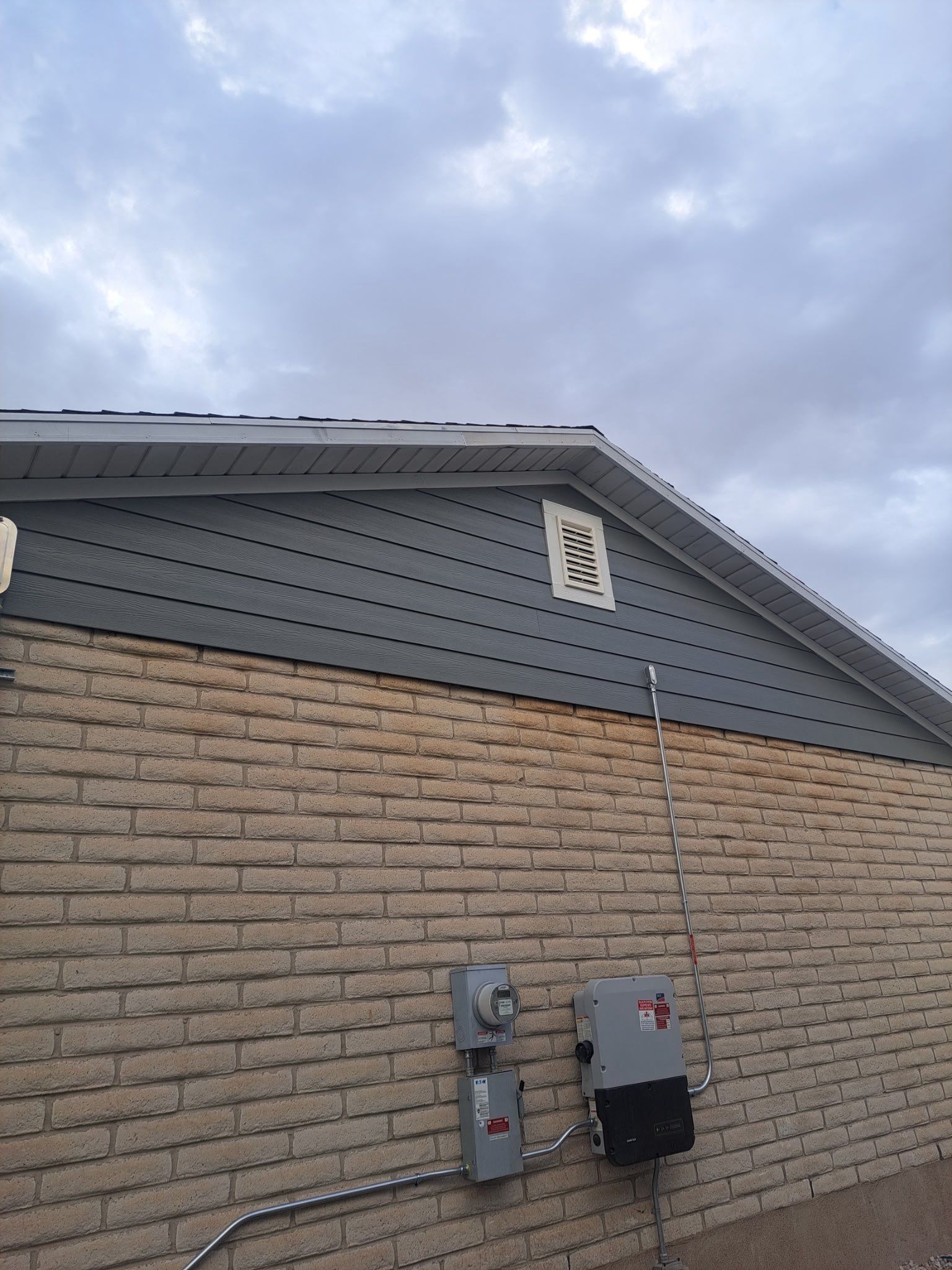 Taylorsville | Hardie Installation & Roofline | Gray Slate & Arctic White by Ideal Siding Utah