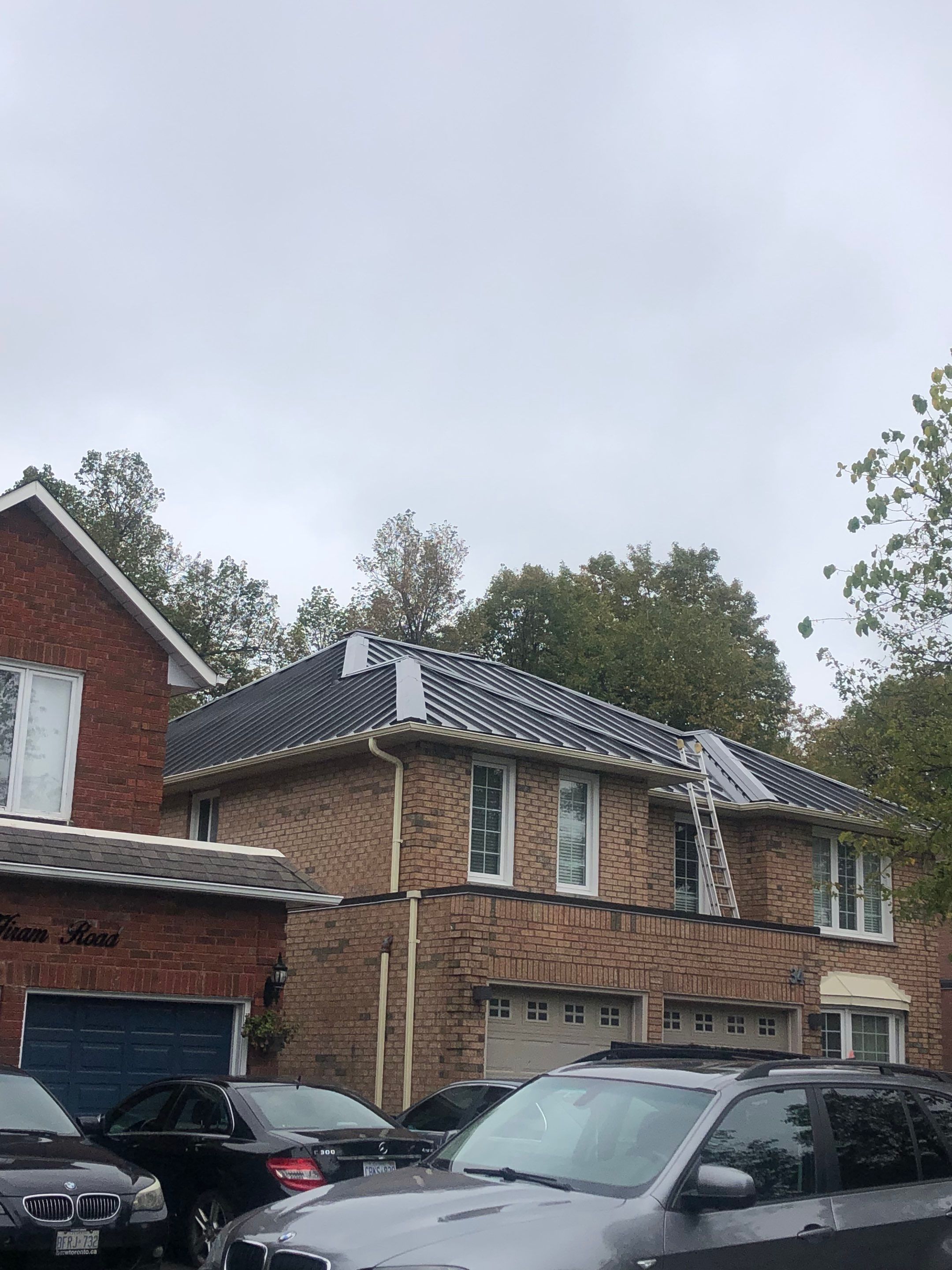 Residential Roofing Installation using 16" Standing Seam Panels by Jay Carter Roofing & Sheet Metal