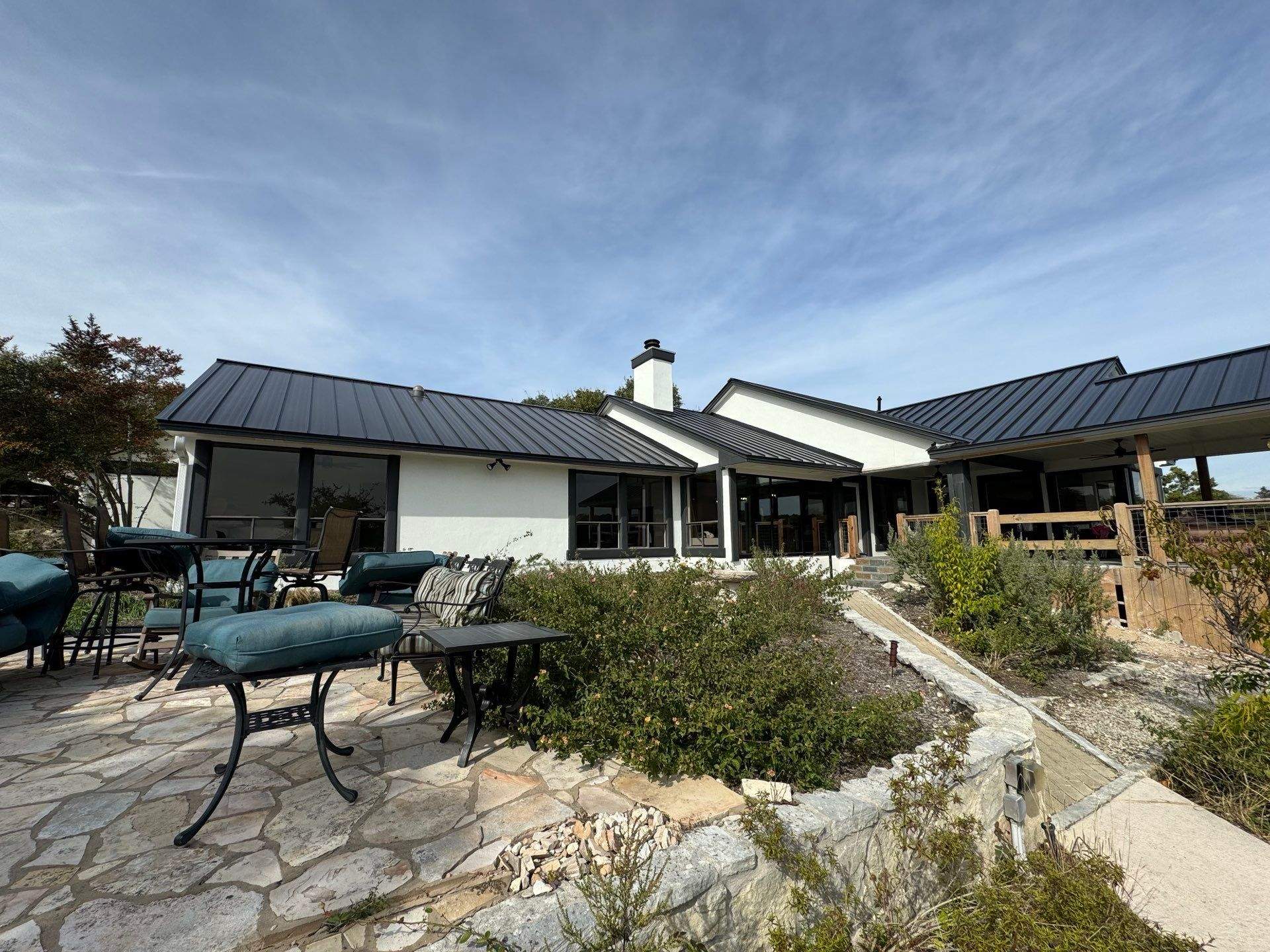 Residential Roofing Installation using Standing Seam Metal (Color, 500 Kynar Finish) in Matte Black by Texas Choice Roofing