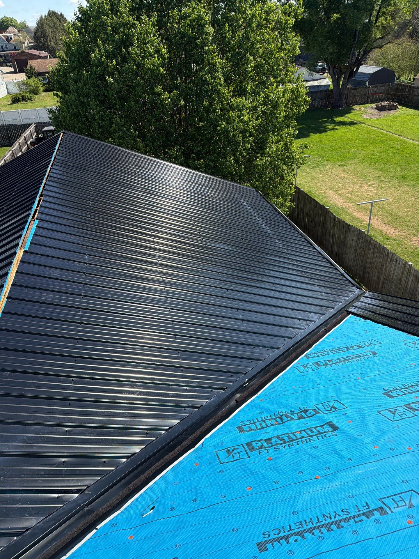 Residential Roofing Installation using Metal by Rainstoppers Roofing
