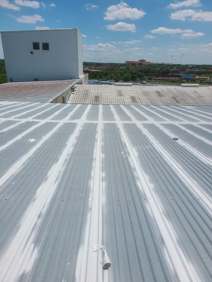 Commercial Metal Restoration System using Aldocoat Coatings by Hostetler Roofing