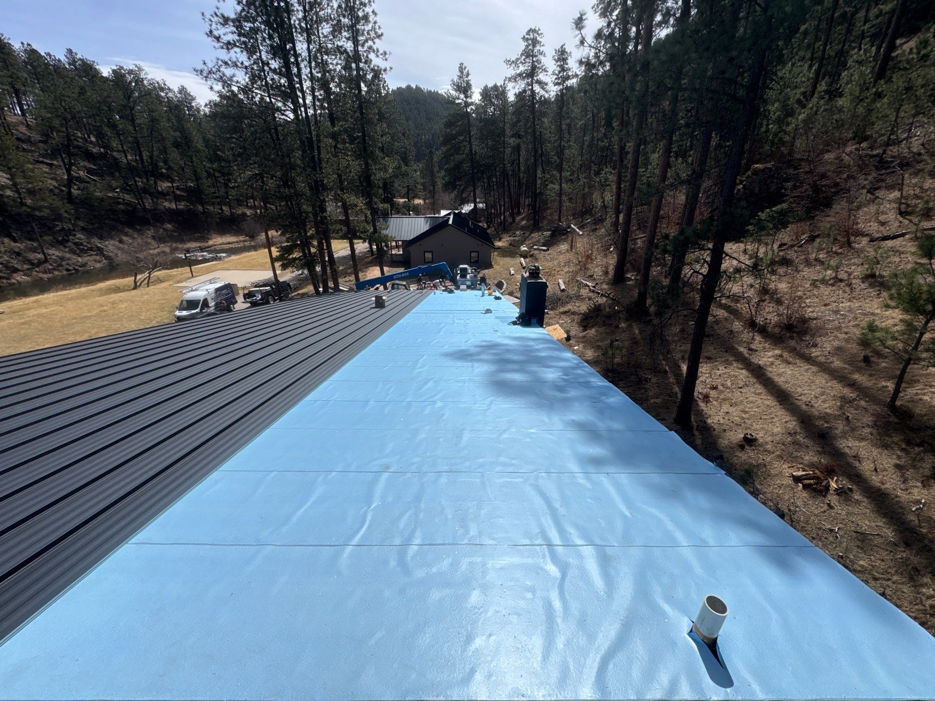 Residential Roofing Installation using Steel Roofing by Weather-Tite Exteriors LLC
