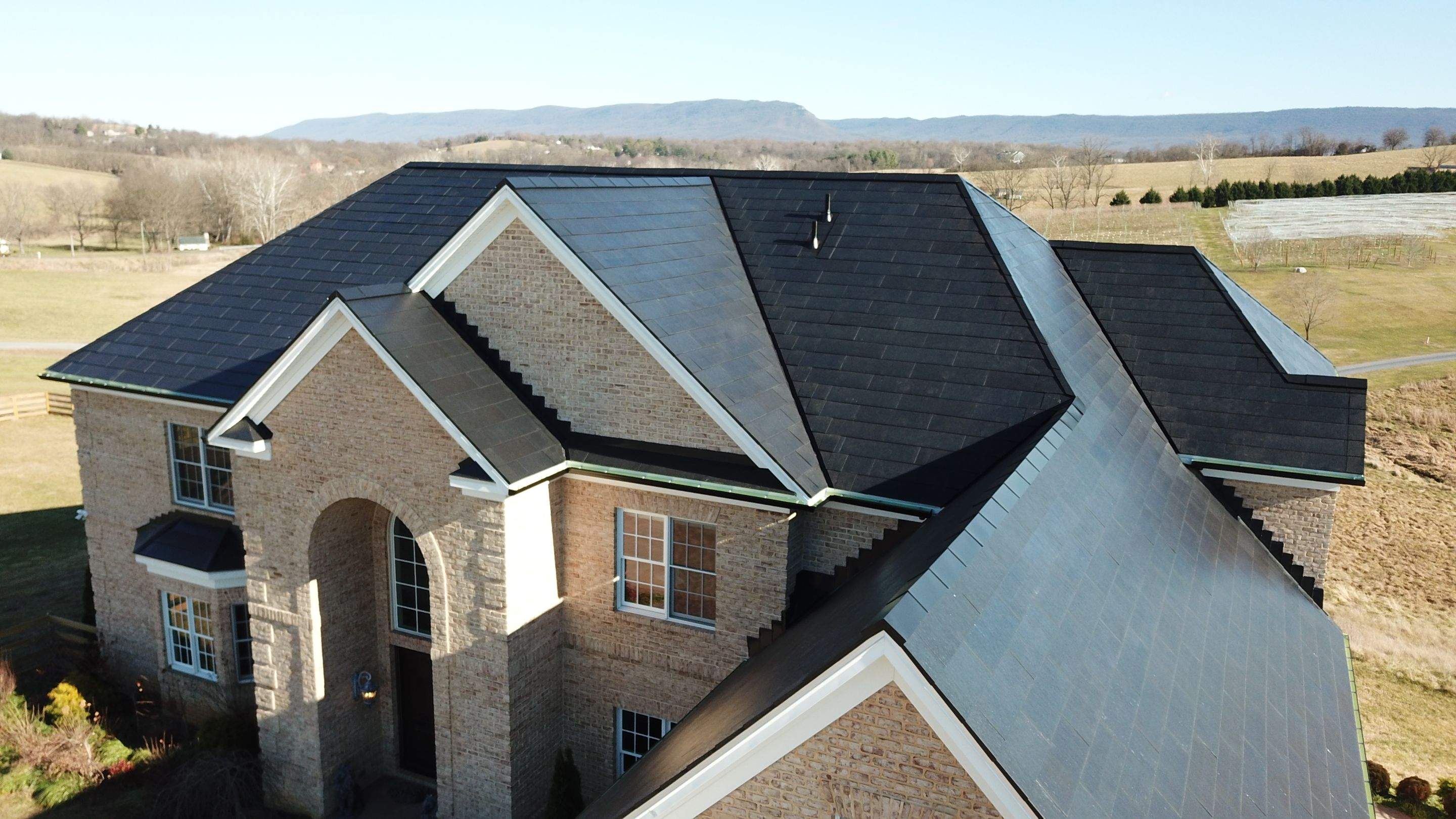 Tesla Solar Roof Replacement by American Home Contractors