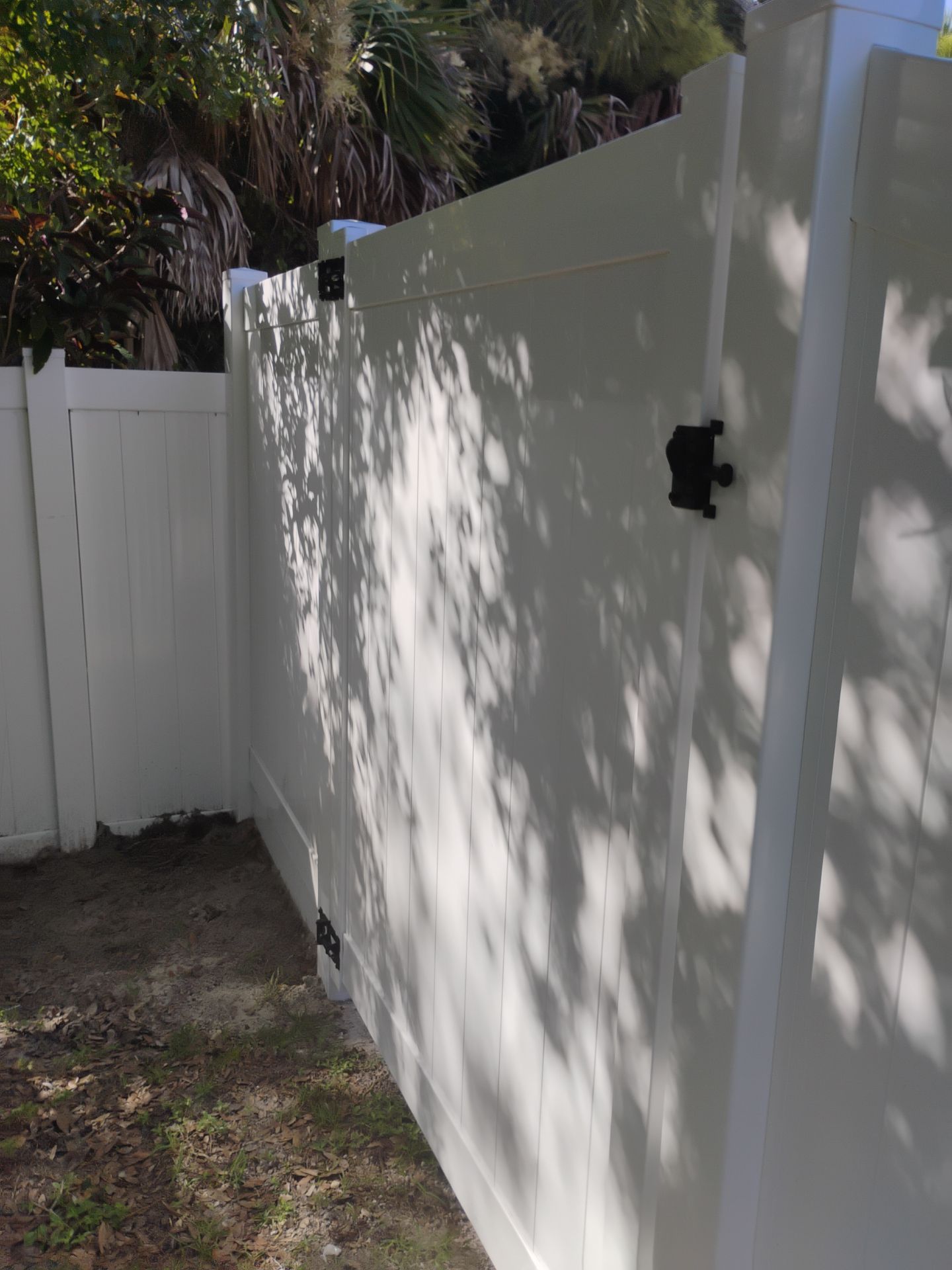 Vinyl Privacy Fence and Double Gate Installation in North Port by True Fence LLC