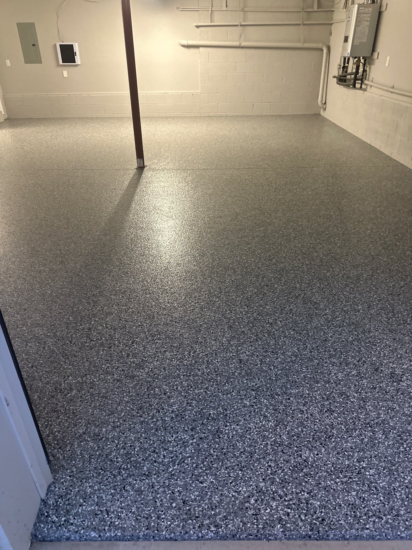 Garage Floor Coating using Wombat by My Garage Floor Guys