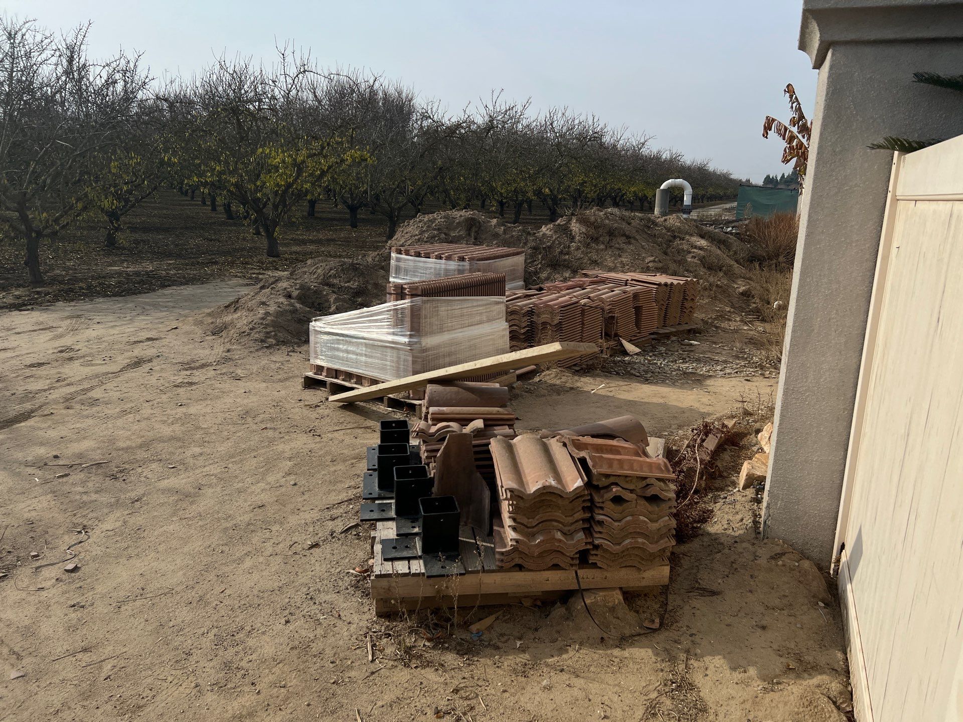 Tile, Metal, and TPO roofing project (new construction) by Straight Edge Roofing Inc