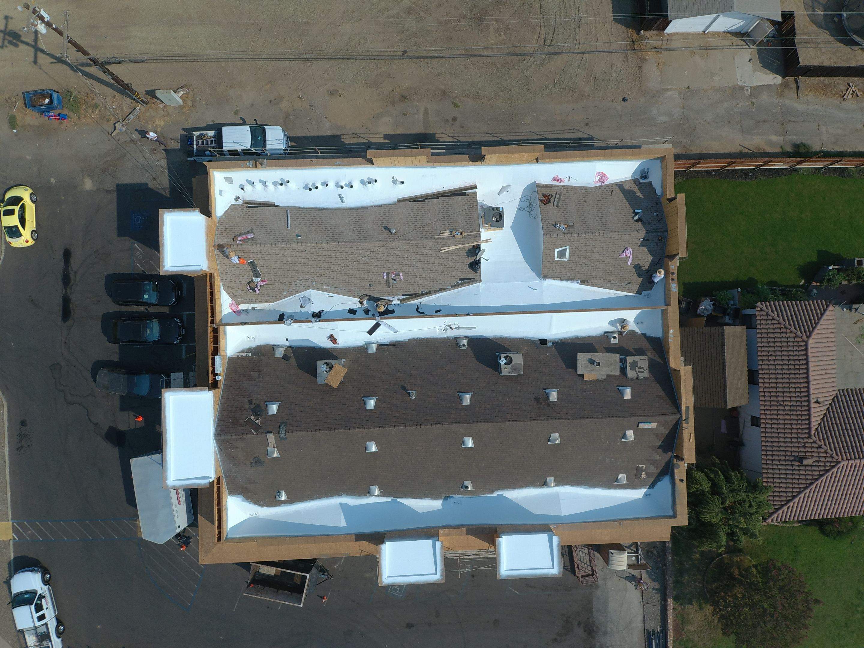 Spray foam and coatings using Conklin Benchmark/PUMA XL coatings and spray foam by Straight Edge Roofing Inc