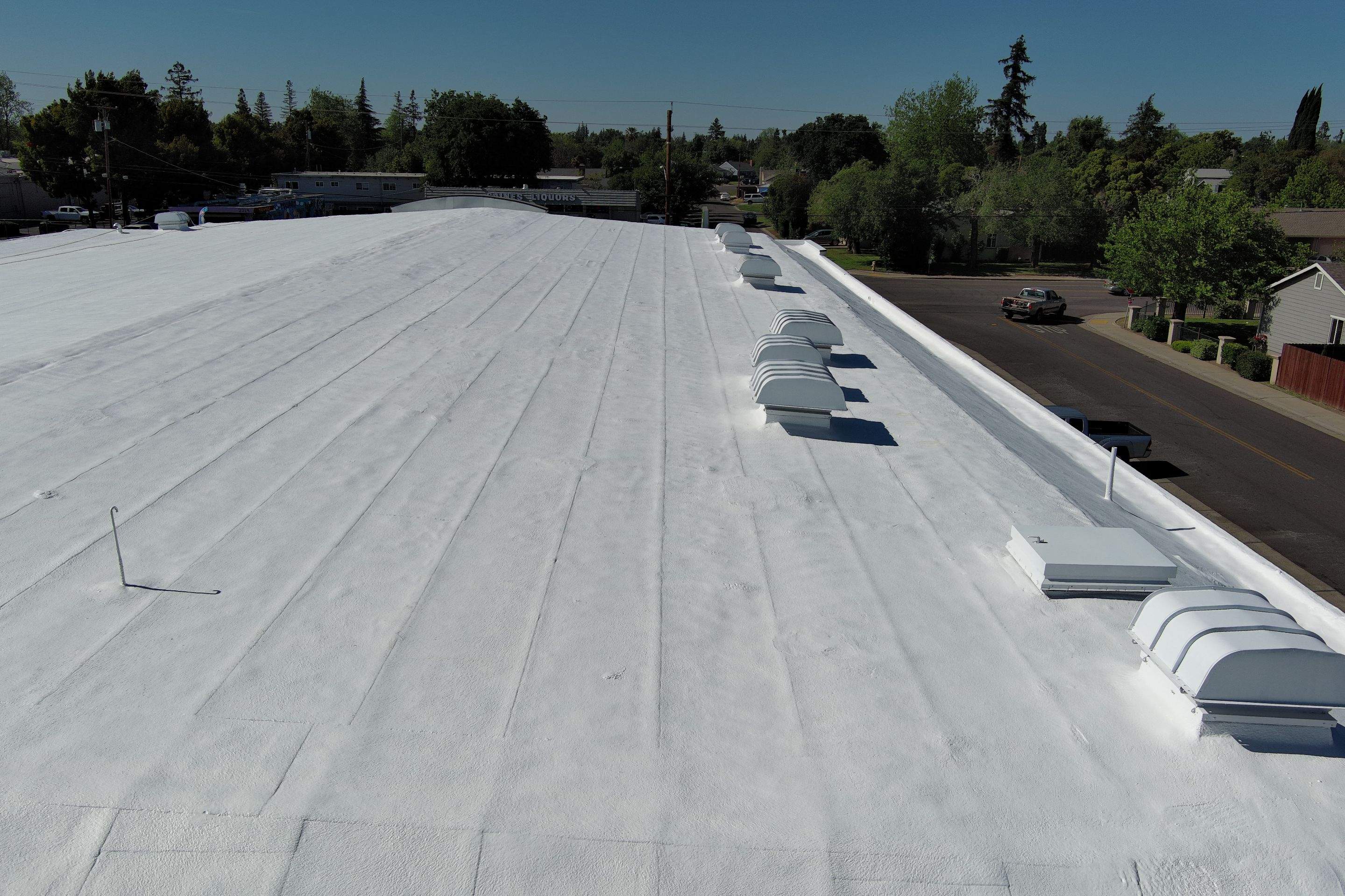 Foam Refurbish using Conklin Benchmark/PUMA XL coatings and spray foam by Straight Edge Roofing Inc