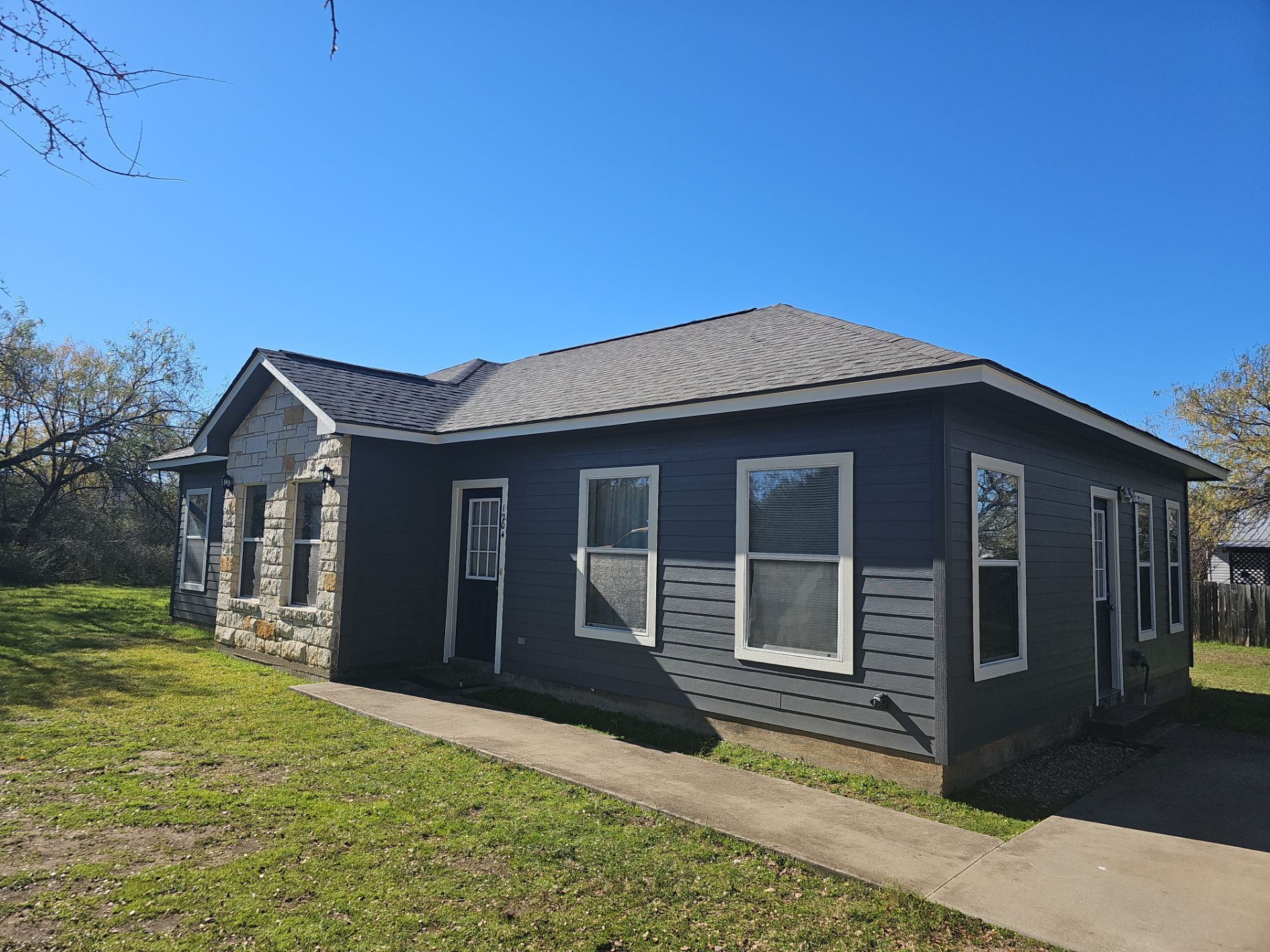 Residential Roofing Installation using Owens Corning Duration TruDef Driftwood by DeZign Roofing & Exteriors