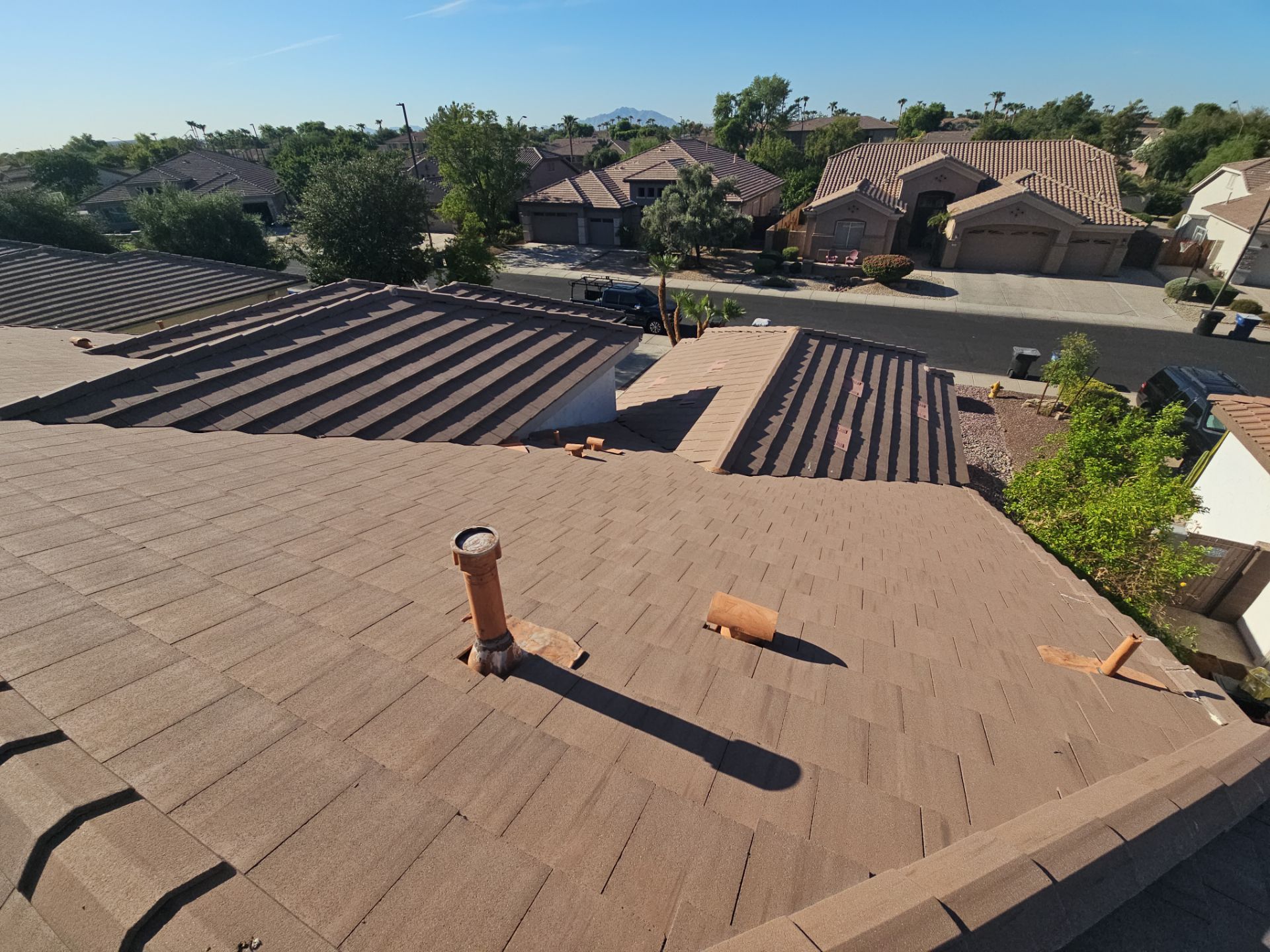 Residential Roofing Installation using Concrete Tile by Weather-Tite Exteriors LLC