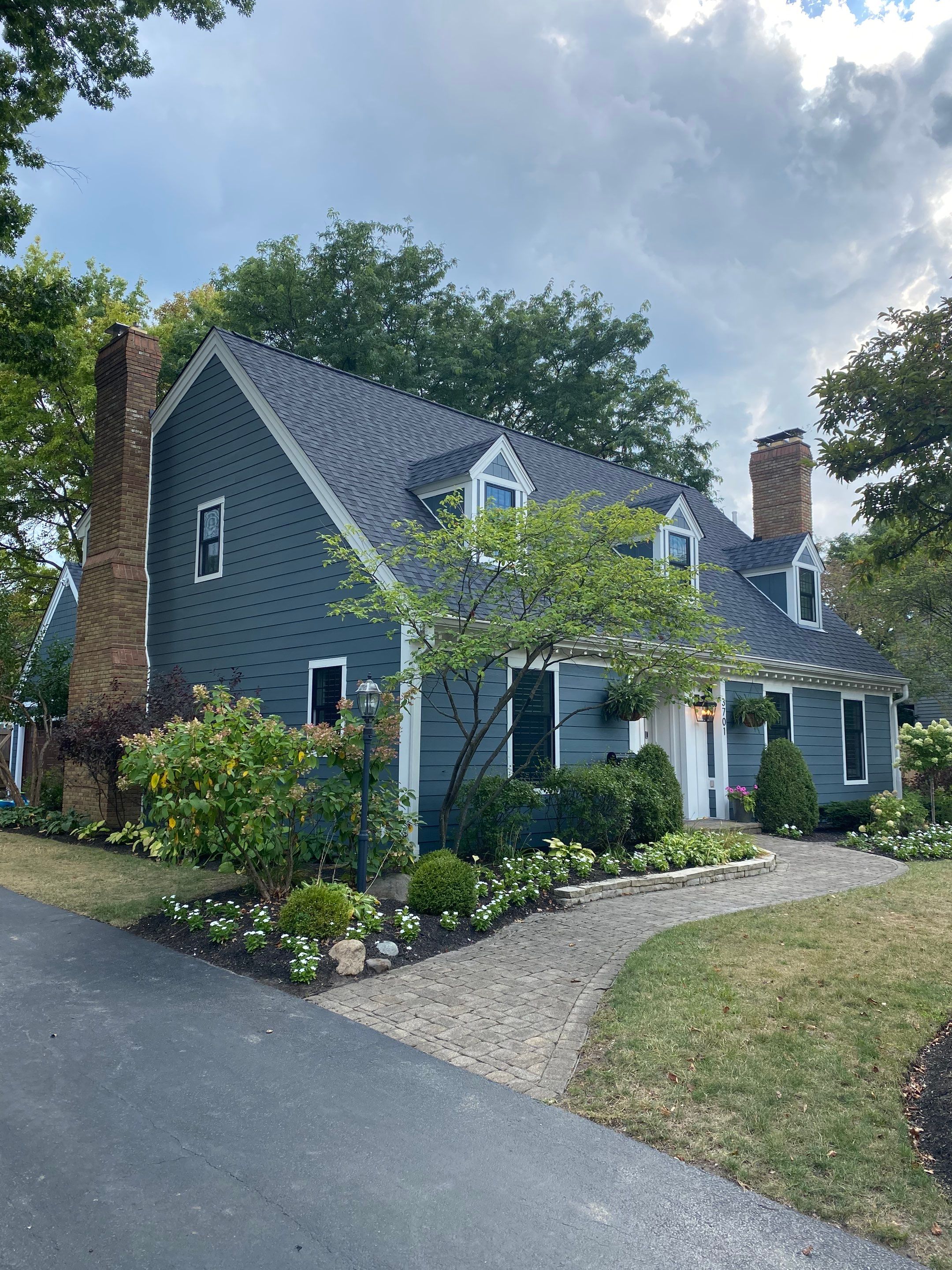 Residential Roofing Installation using James Hardie Fiber Cement Lap Siding and Certainteed Landmark Pro Shingles by Best Exteriors Inc