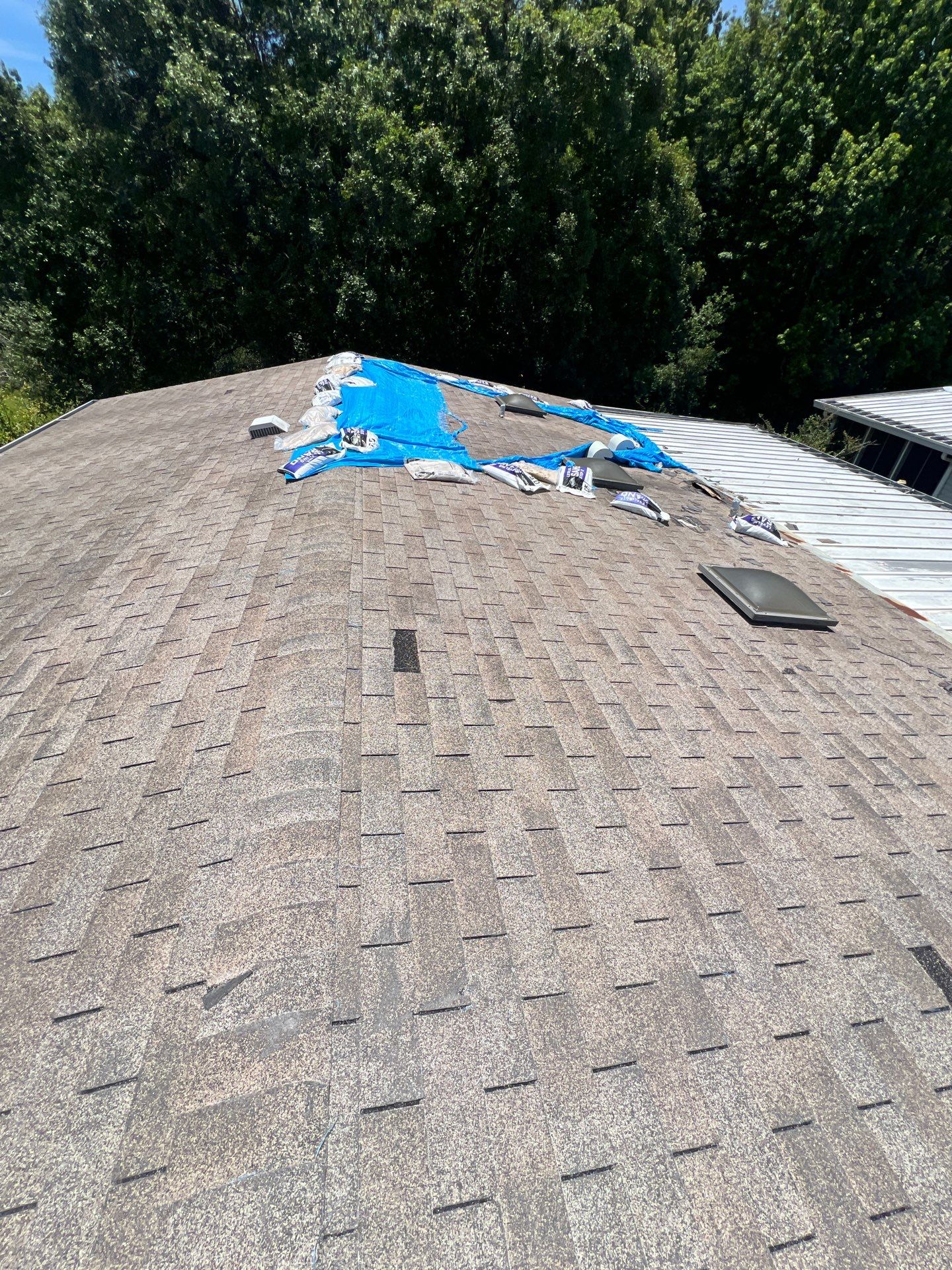 Orlando Residential Standing Seam Metal Roof Installation in Light Stone by Pinnacle Roofing Group