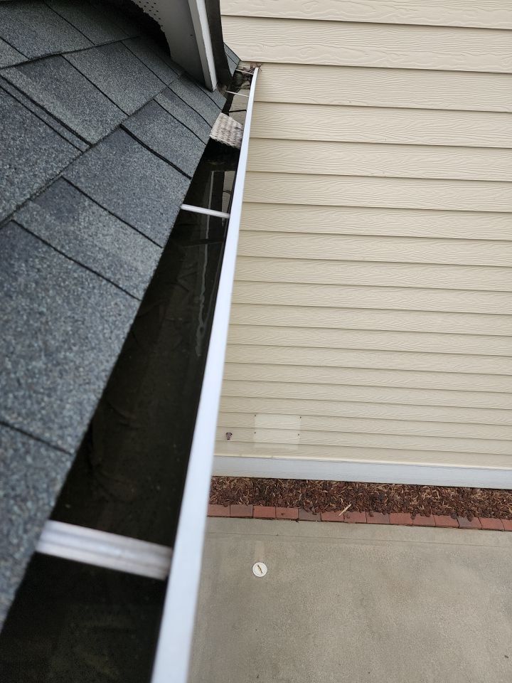 Gutter Cleaning using cleaner by Power Wash Masters LLC