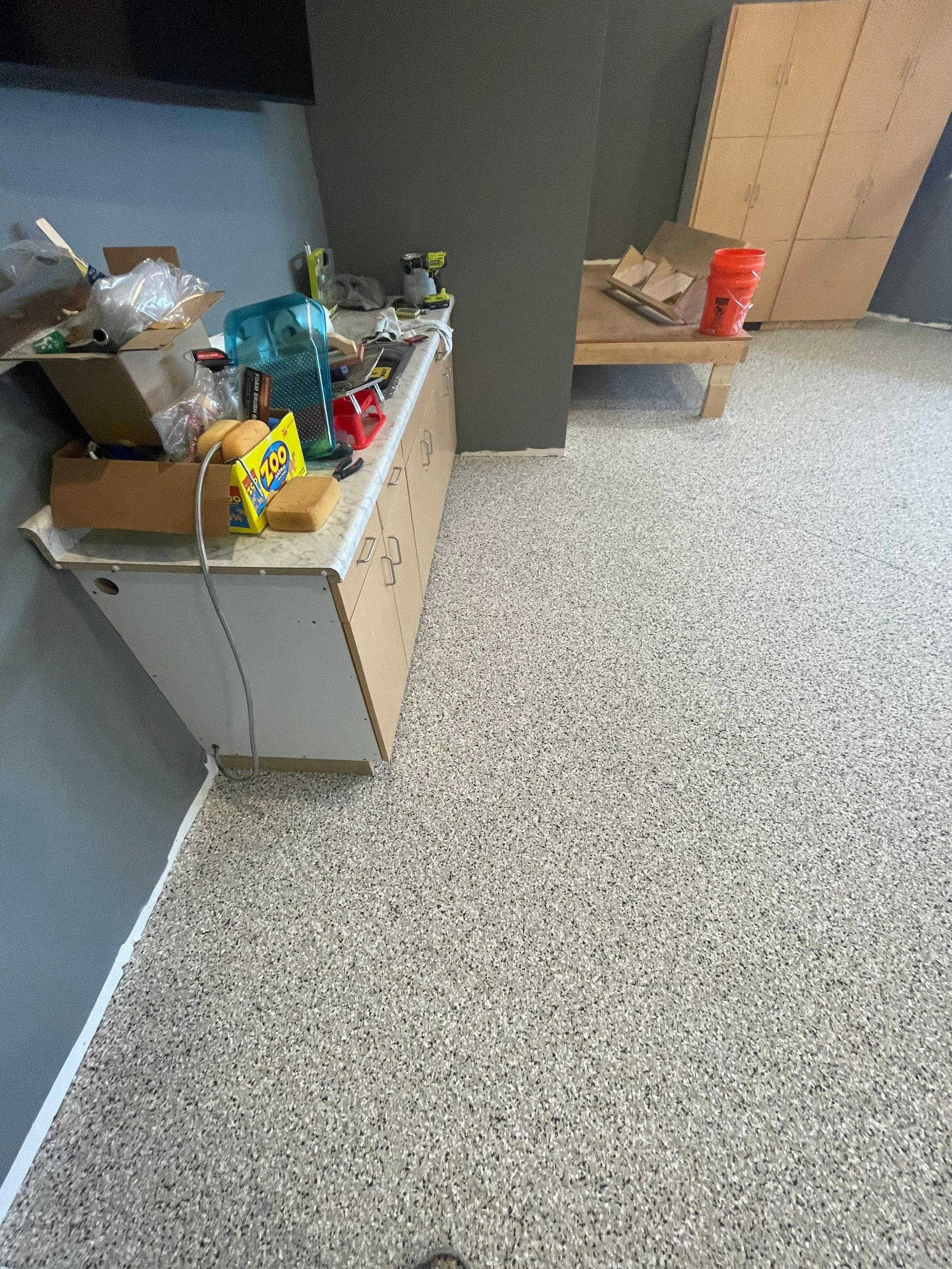 Custom Speckled Concrete Coating for Dell Rapids Garage by Select Painting, Coatings & Garage Cabinets