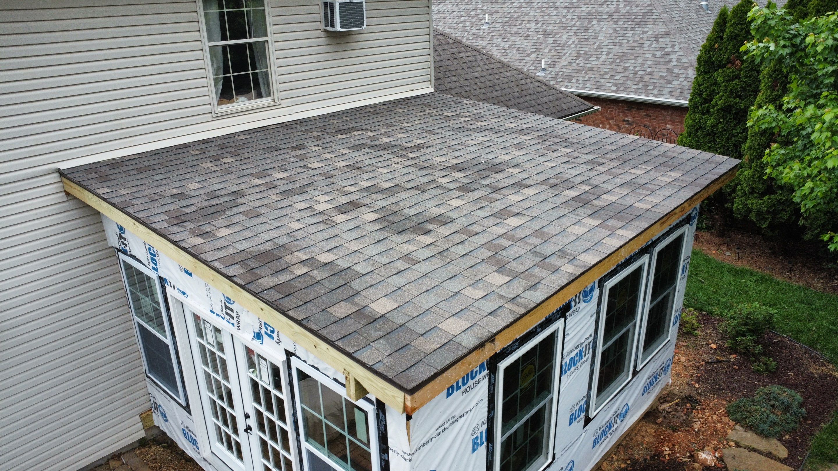 Residential Porch Roof Install - Atlas Pinnacle Pristine Shingle - Color Weathered Wood  by Titan Commercial & Residential Roofing 