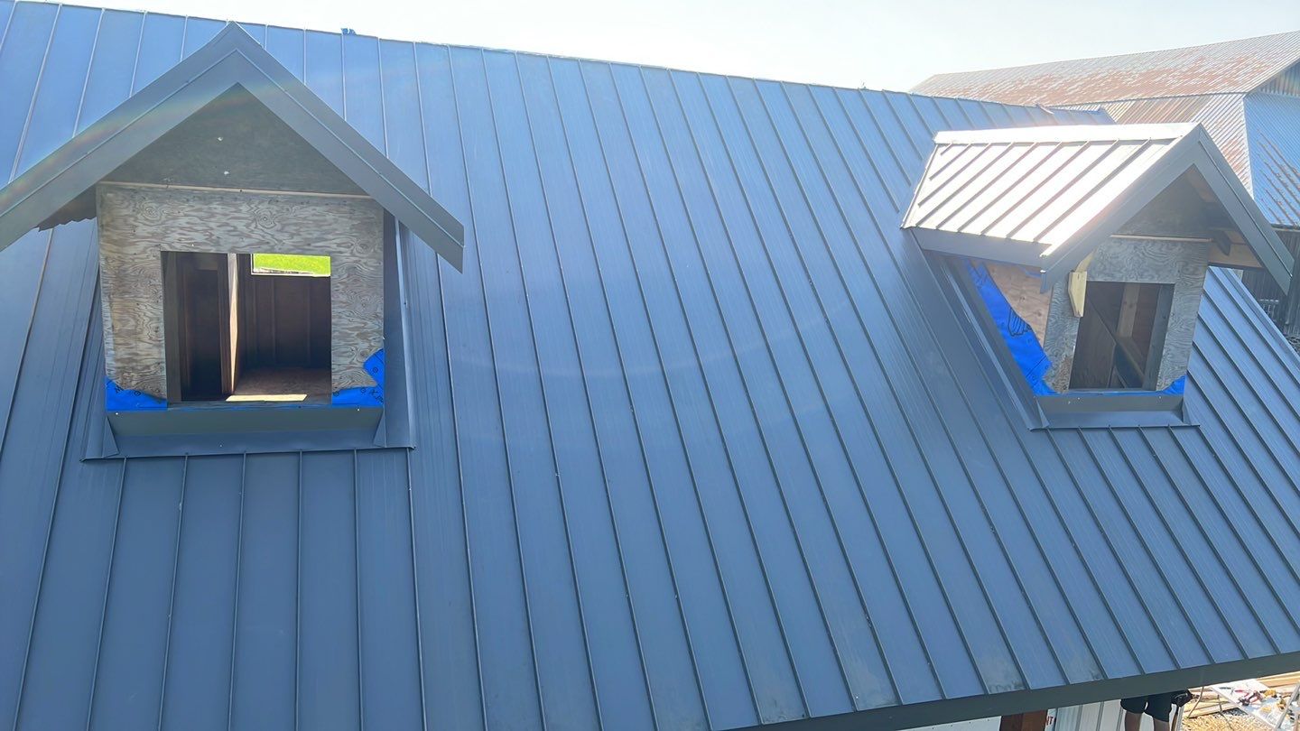 Agricultural Roofing Installation using 12" Prolok metal  by Top Notch Roofing Inc