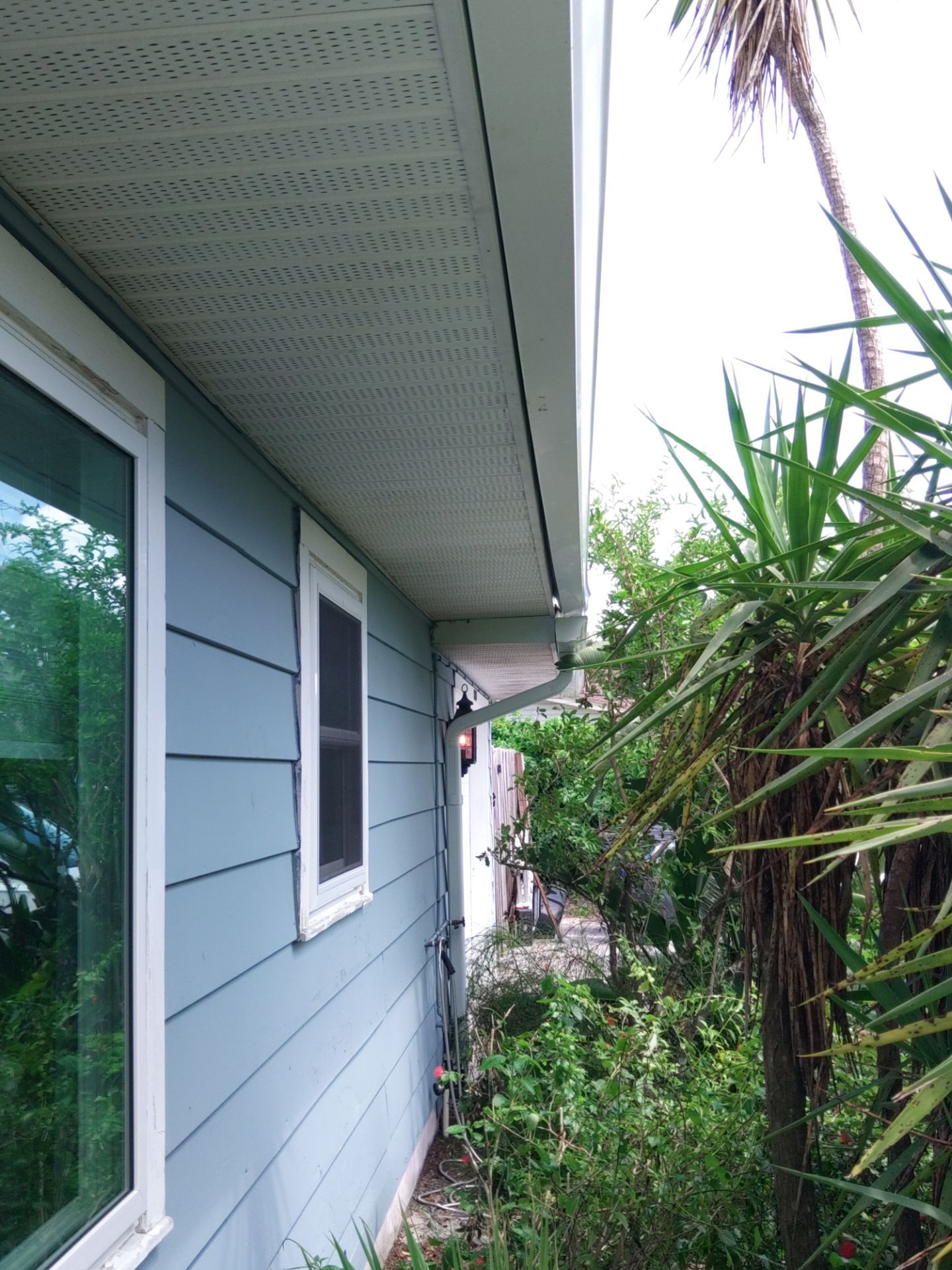 White 6-Inch Gutters and Leaf Guard Installation in Fort Myers FL by Gutter Professors