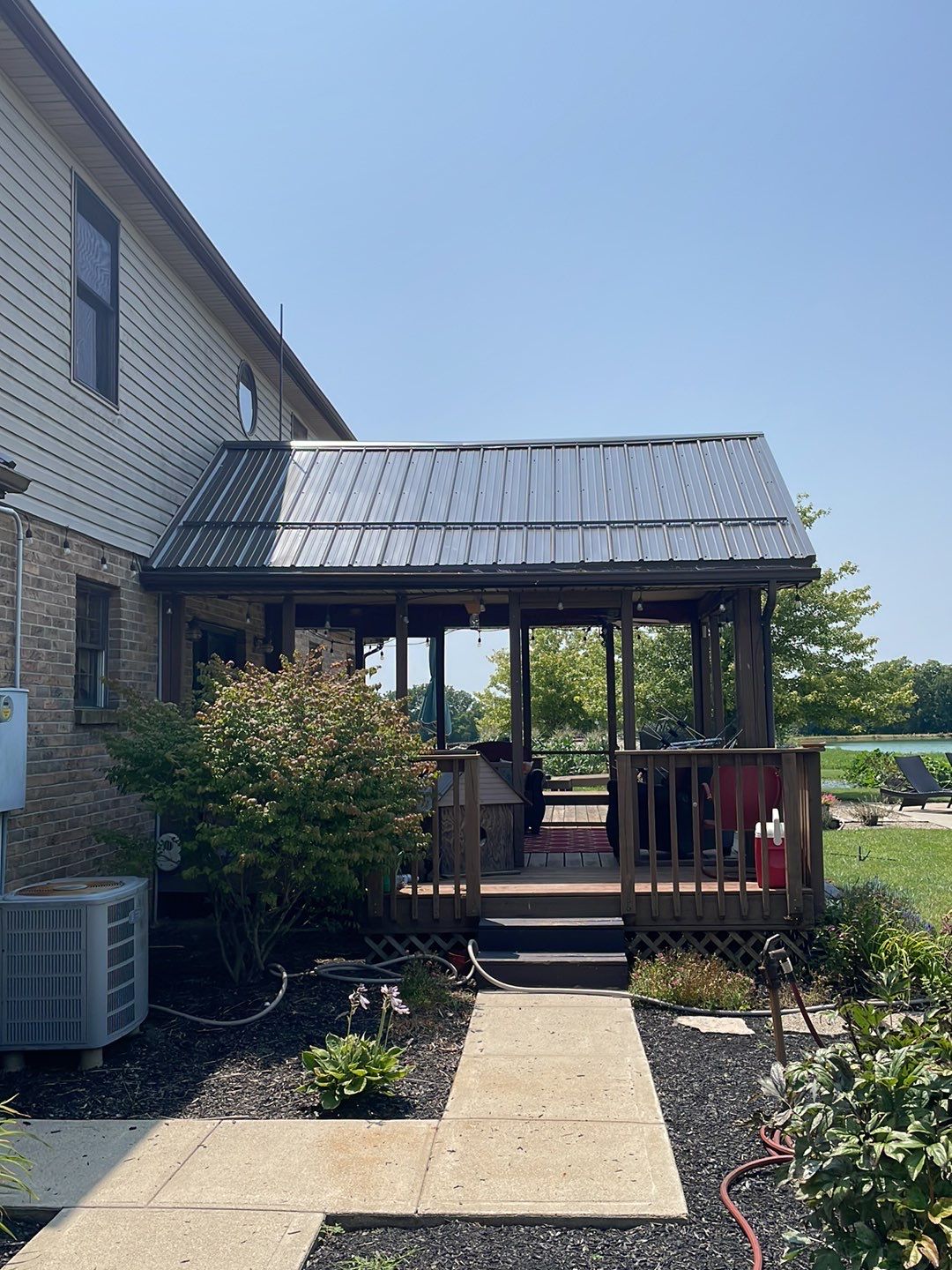 Residential Roofing Installation using Performance Panel Metal - Burnished Slate by RoofX 