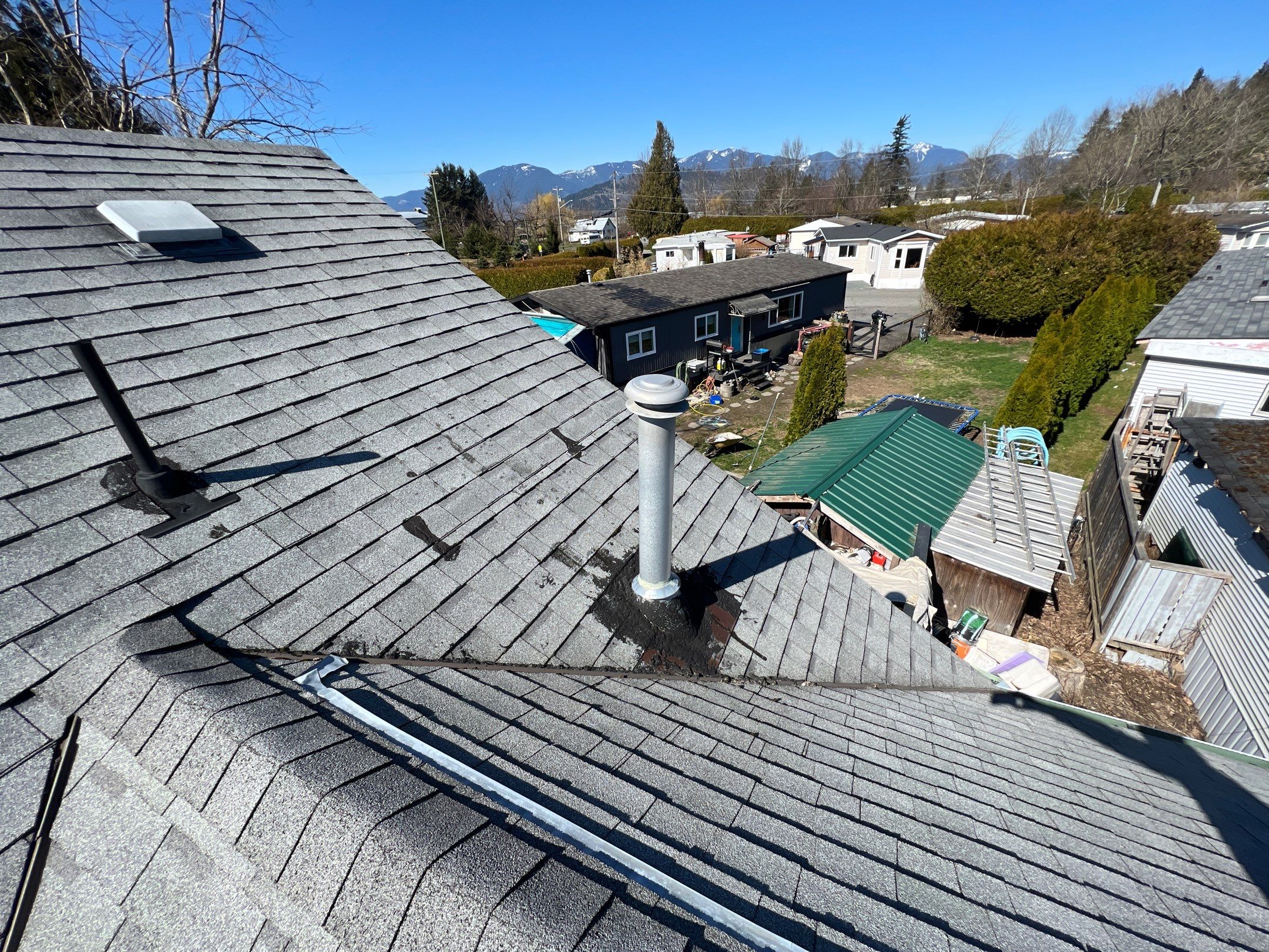 Residential Roofing Installation using Estate Gray Shingles by Top Notch Roofing Inc