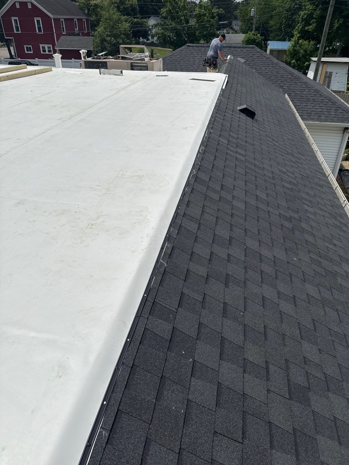 Commercial Flat and Shingled Roof Project by 42 North Construction, LLC.